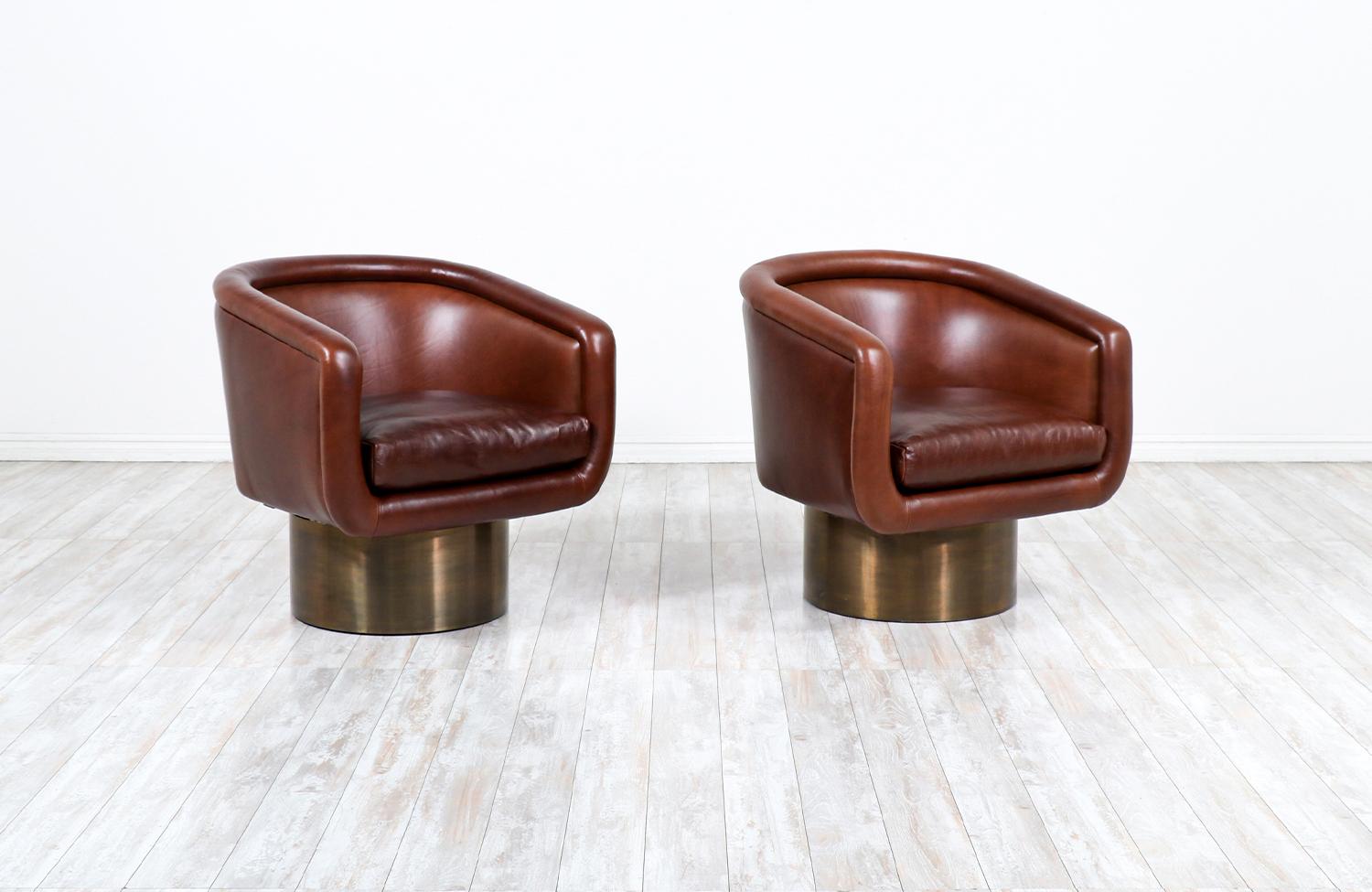 Leon Rosen Cognac leather swivel chairs with bronze bases for Pace.