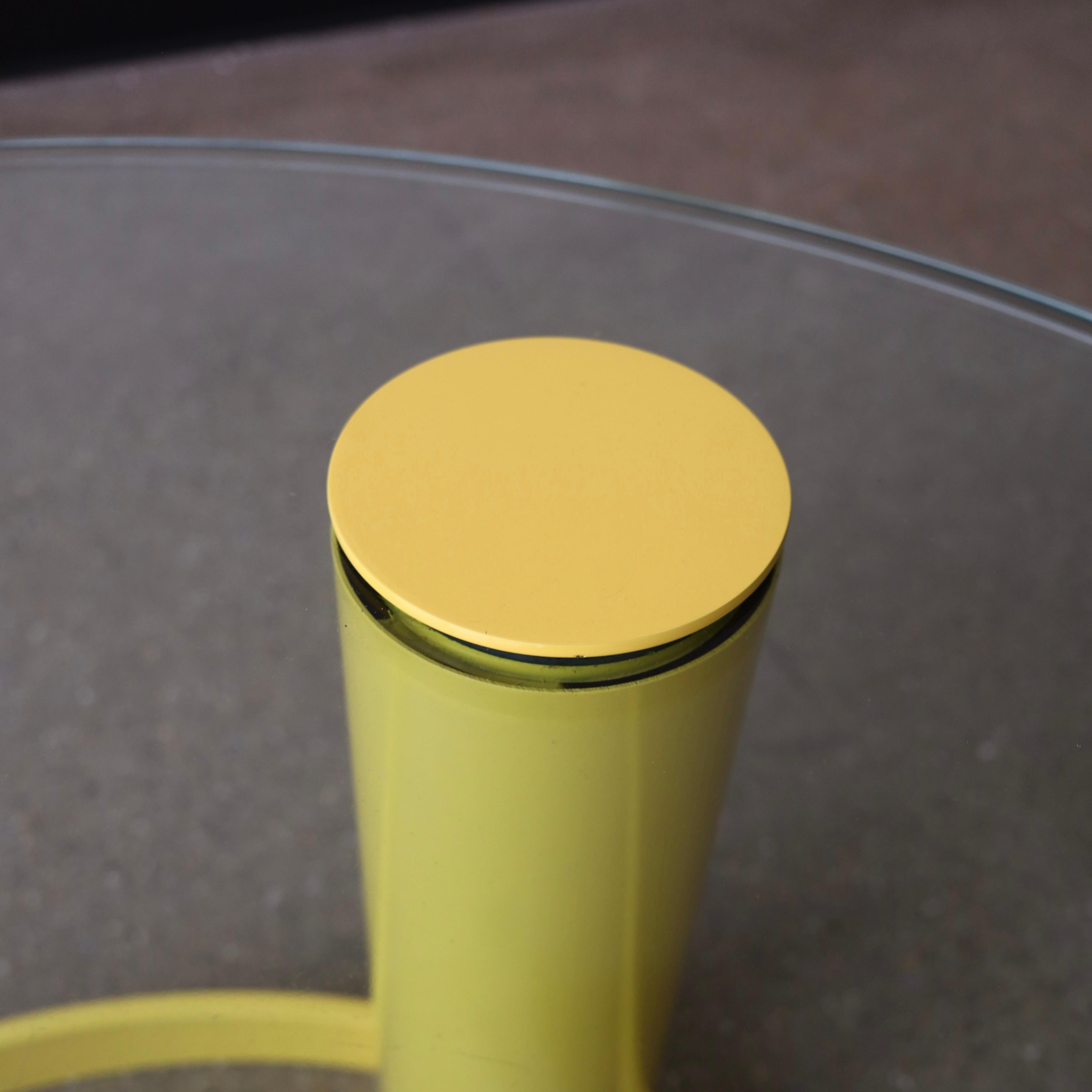 c. 1970s in matte yellow. This piece is in great condition with the exception of a nearly imperceptible flaw in the glass. It’s not a chip or a scratch but just a natural flaw on the edge. There is also wear consistent with age and use on the glass