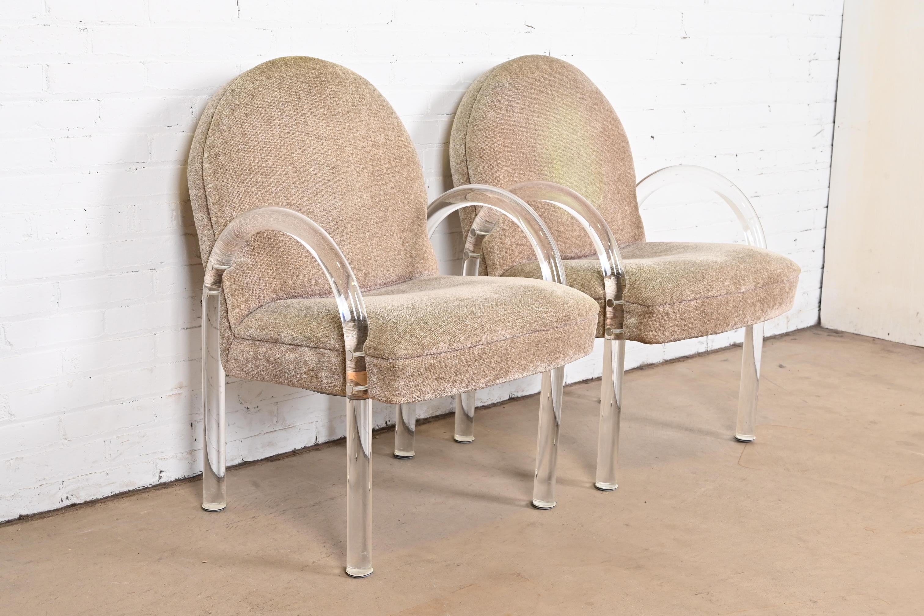 A gorgeous pair of Modern Art Deco lucite waterfall armchairs, club chairs, or lounge chairs

By Leon Rosen for The Pace Collection

USA, 1970s

Sculptural lucite frames, with light tan upholstery.

Measures: 22.5