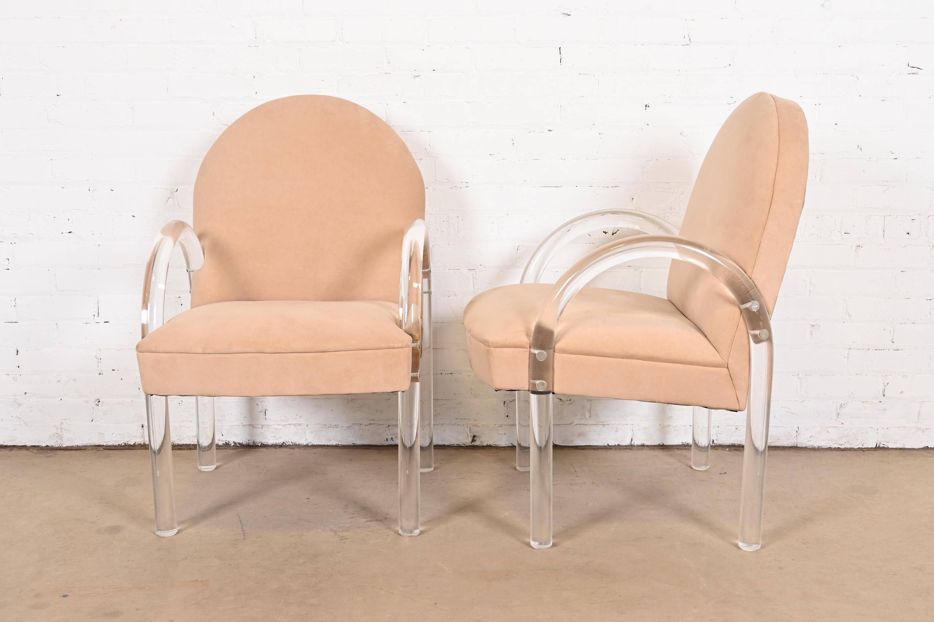 A gorgeous pair of Modern Art Deco or Mid-Century Modern lucite waterfall armchairs, club chairs, or lounge chairs

By Leon Rosen for The Pace Collection

USA, 1970s

Sculptural lucite frames, with light tan suede upholstery.

Measures: 22.5