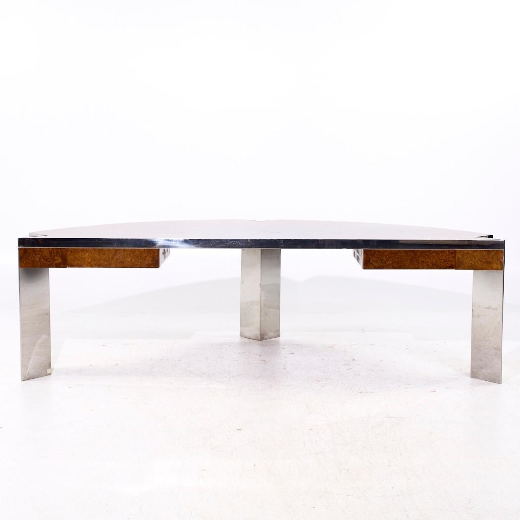 Leon Rosen for Pace Mezzaluna Mid Century Burlwood and Stainless Steel Desk

This desk measures: 96 wide x 40.5 deep x 28.75 high, with a chair clearance of 22.75 inches

All pieces of furniture can be had in what we call restored vintage condition.
