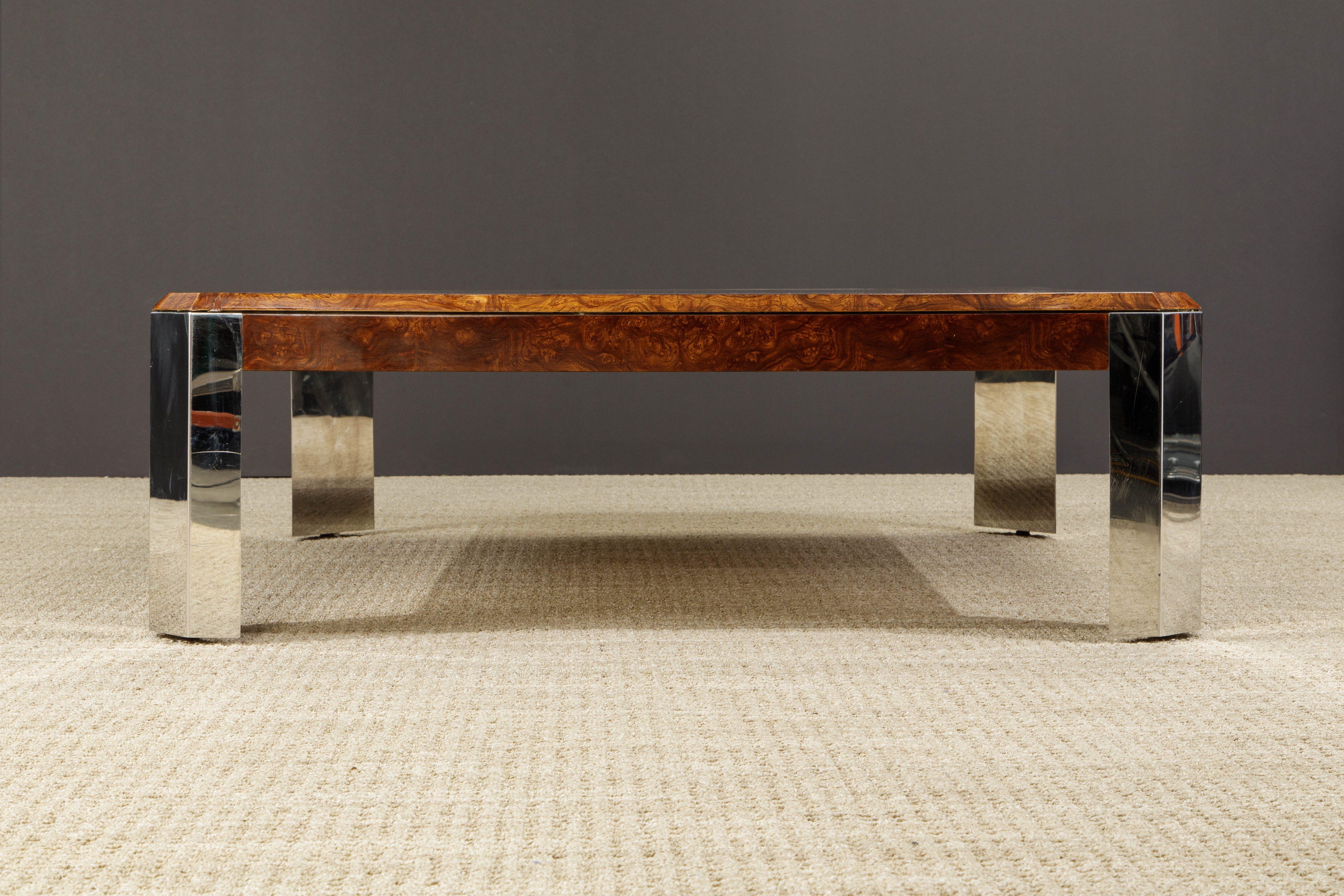 Expansive coffee table by Leon Rosen for The Pace collection. This large proportioned cocktail table is fabricated from exquisite lacquered burlwood which displays a mesmerizing grain and a stunning contrast of colors. The classy beveled top is