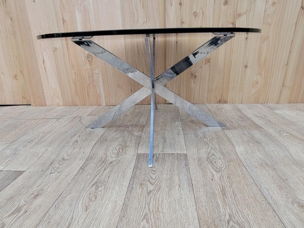 Vintage Modern Leon Rosen Pace Collection Chrome JAX-Double X Base Tinted Round Glass Top Coffee Table

Vintage modern Leon Rosen for Pace Collection style heavy chrome JAX-base and smoked glass top round cocktail table. Chic and elegantly modern