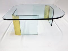 Leon Rosen Style Thick Glass and Brass Coffee Table Pace Collection