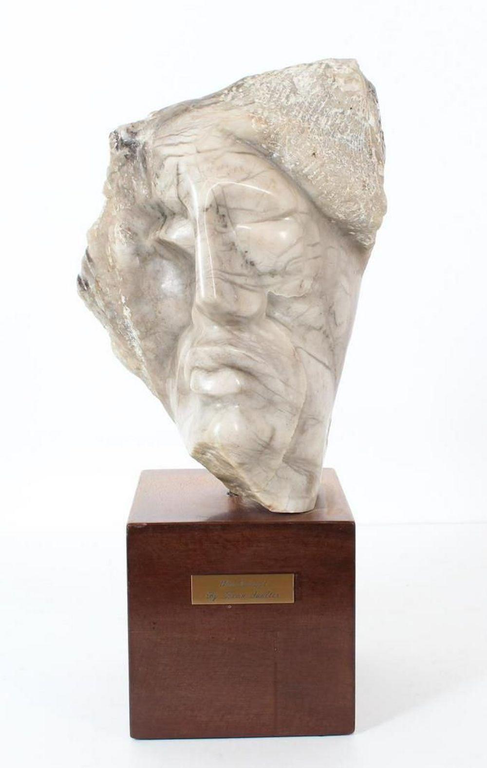 Leon Saulter  Figurative Sculpture - Windswept Face Of A Man Marble Sculpture 