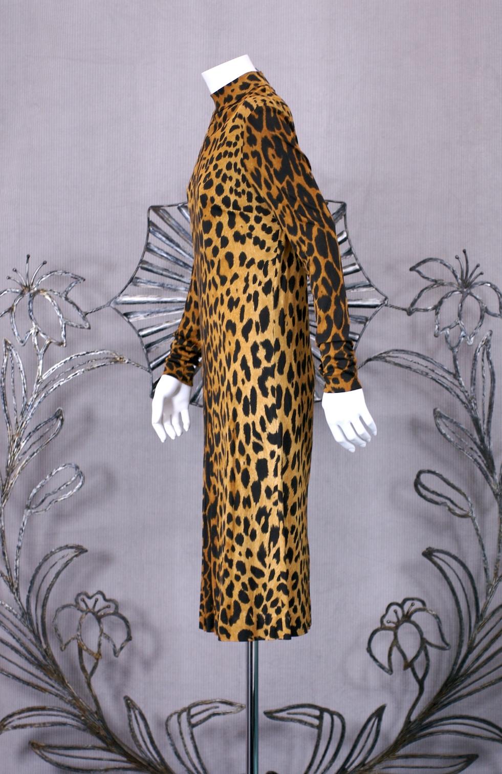 Bodycon Leonard silk jersey simple sheath dress with all over cheetah print. Simple cut with back zip in signature Leonard print. 1970's France. 
Small size equivalent 2-4.  Leonard size 3, Label 