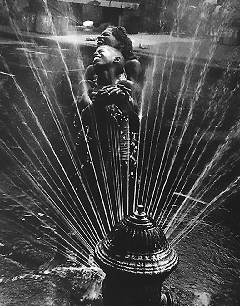 Fire Hydrant, Harlem, NYC, Black and White Photo 1960s African American Children - Photograph by Leonard Freed