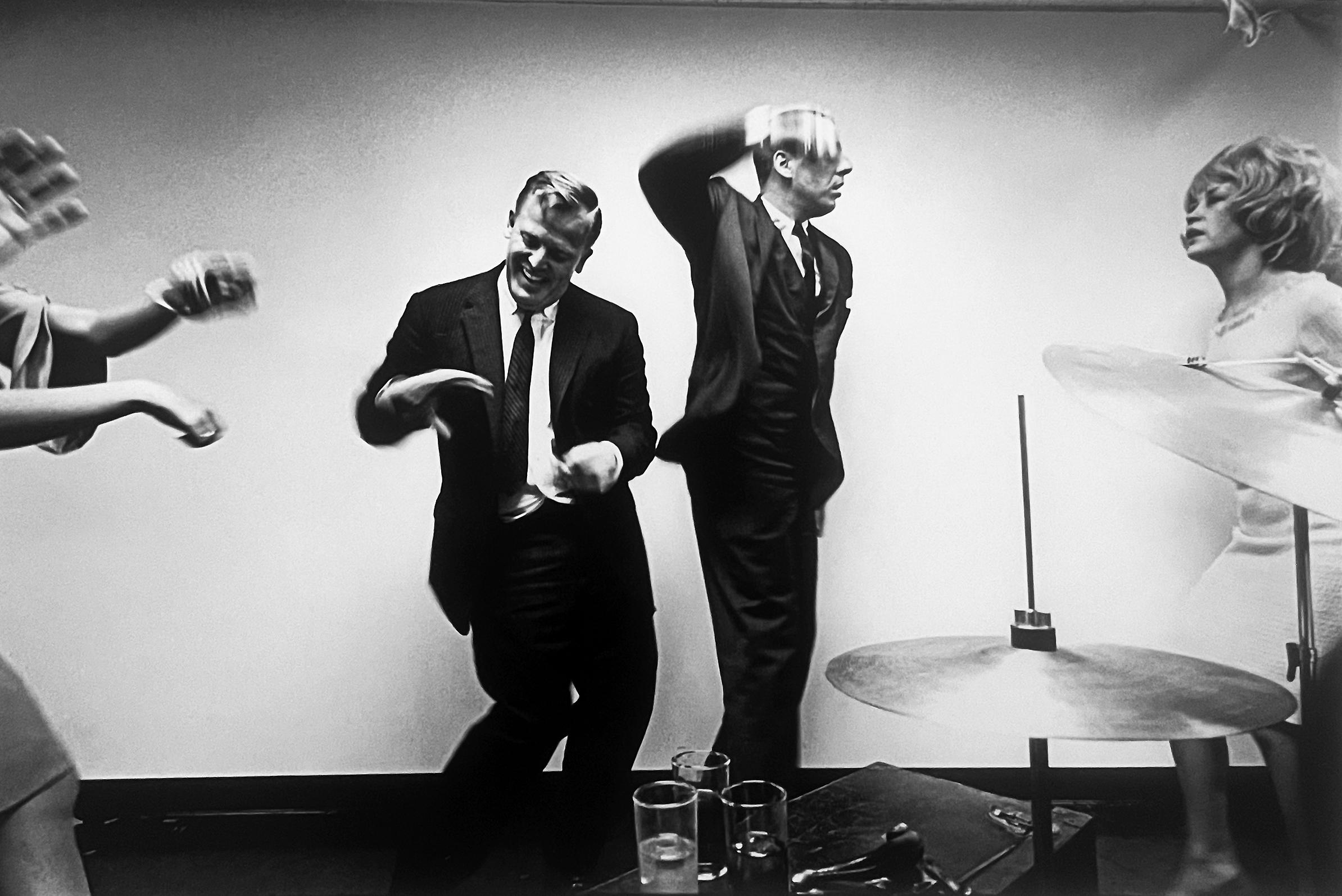 Office party, New York City, A Signed Gelatin Silver Photograph from the 1960s - Gray Black and White Photograph by Leonard Freed
