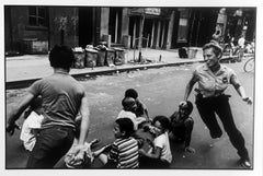 Police Woman Playing With Children, Black and White Limited Edition Photograph