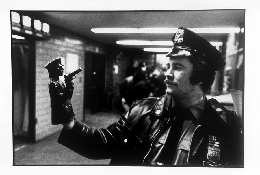 1979 Black and White Photo of Policeman with Puppet and Gun, New York, Ed. 1/10