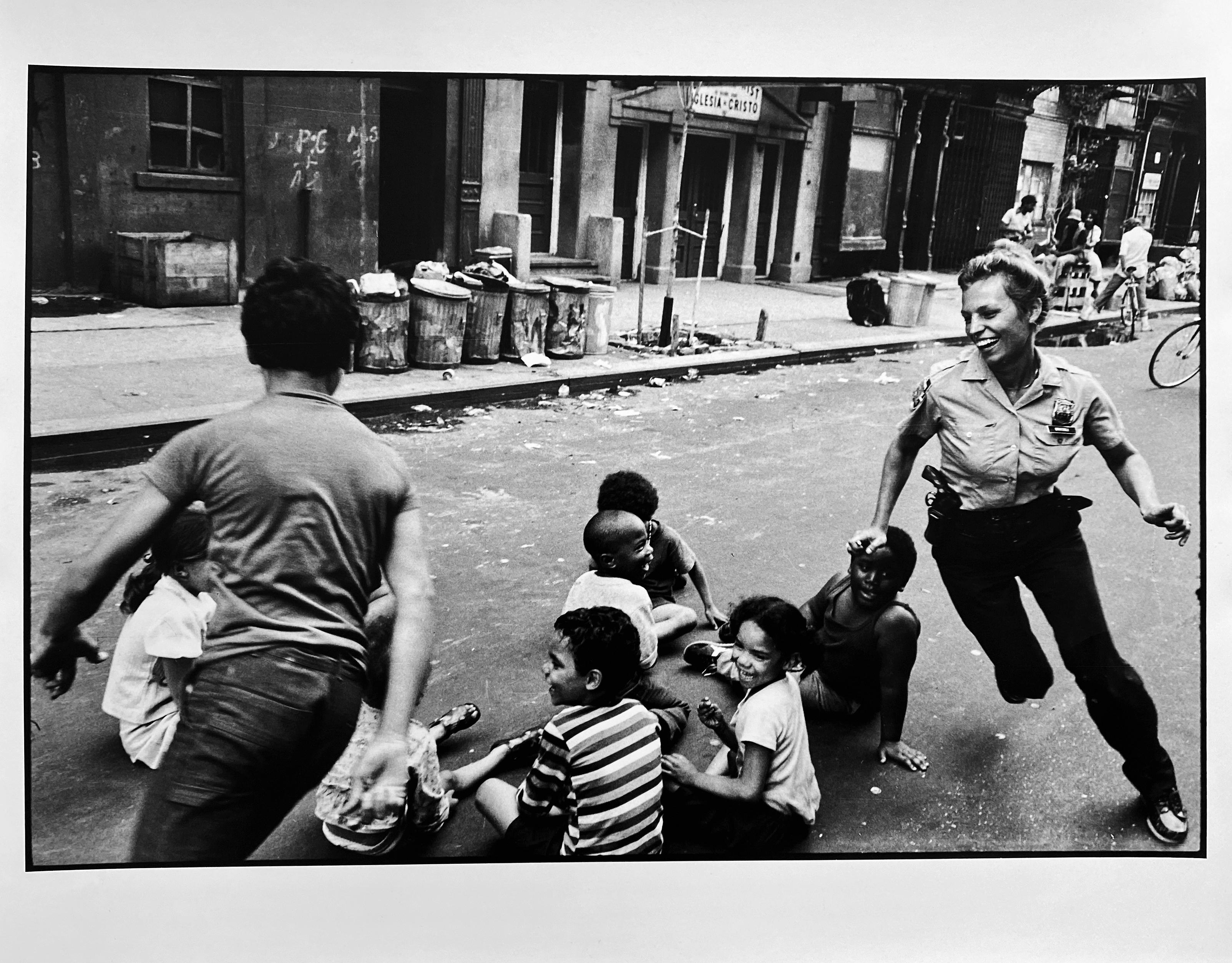 Policewoman Playing Tag, New York City, Police Series Street Photography 1970s