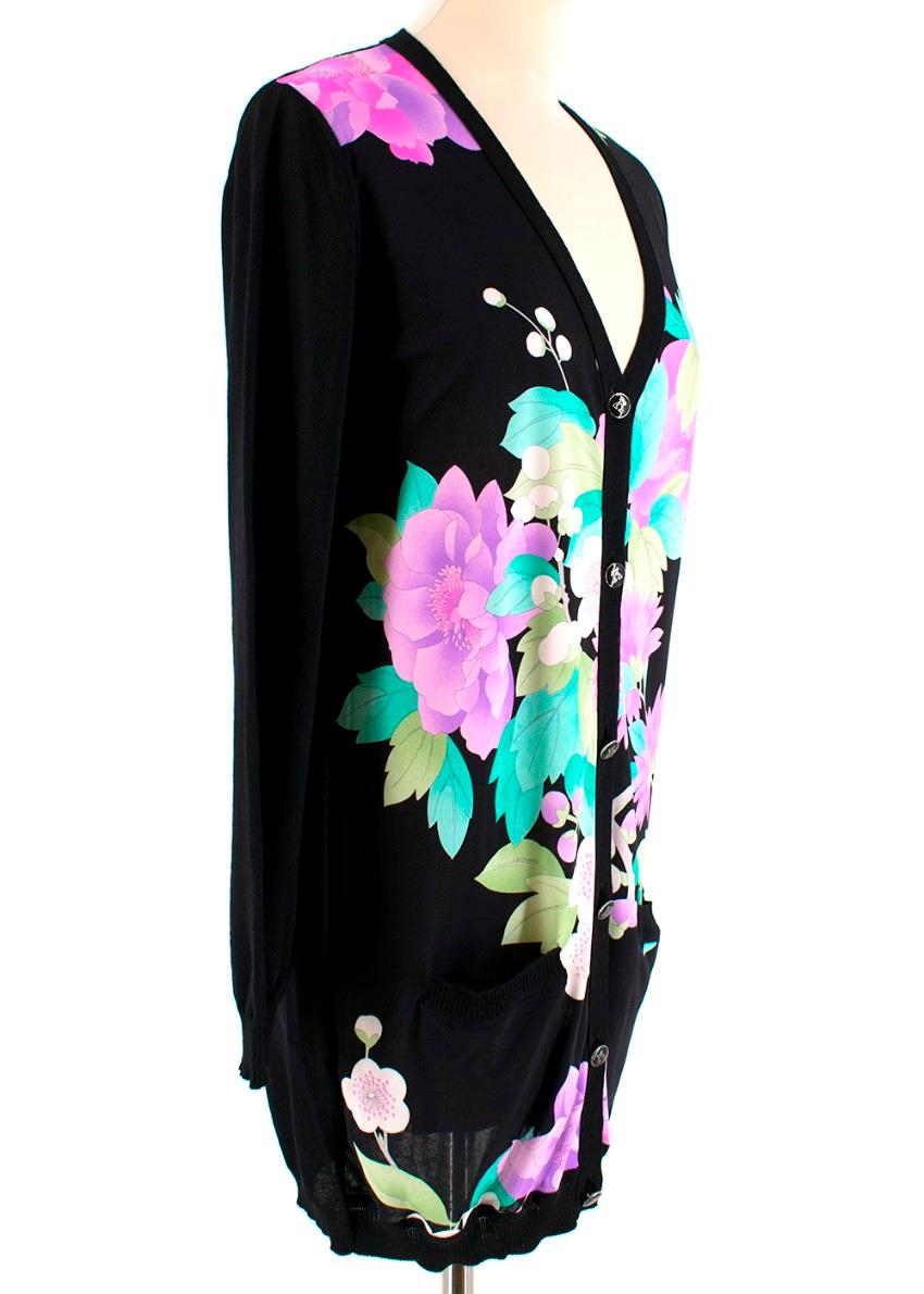 Leonard Black Cardigan with Floral Silk Front 
- Black Wool cardigan
- Two small front pockets 
- Silk front panel with Floral detailing in pinks, purples and greens
- V shape neck line 
- Six black enamel and Silver-tone buttons 
- Lightweight with