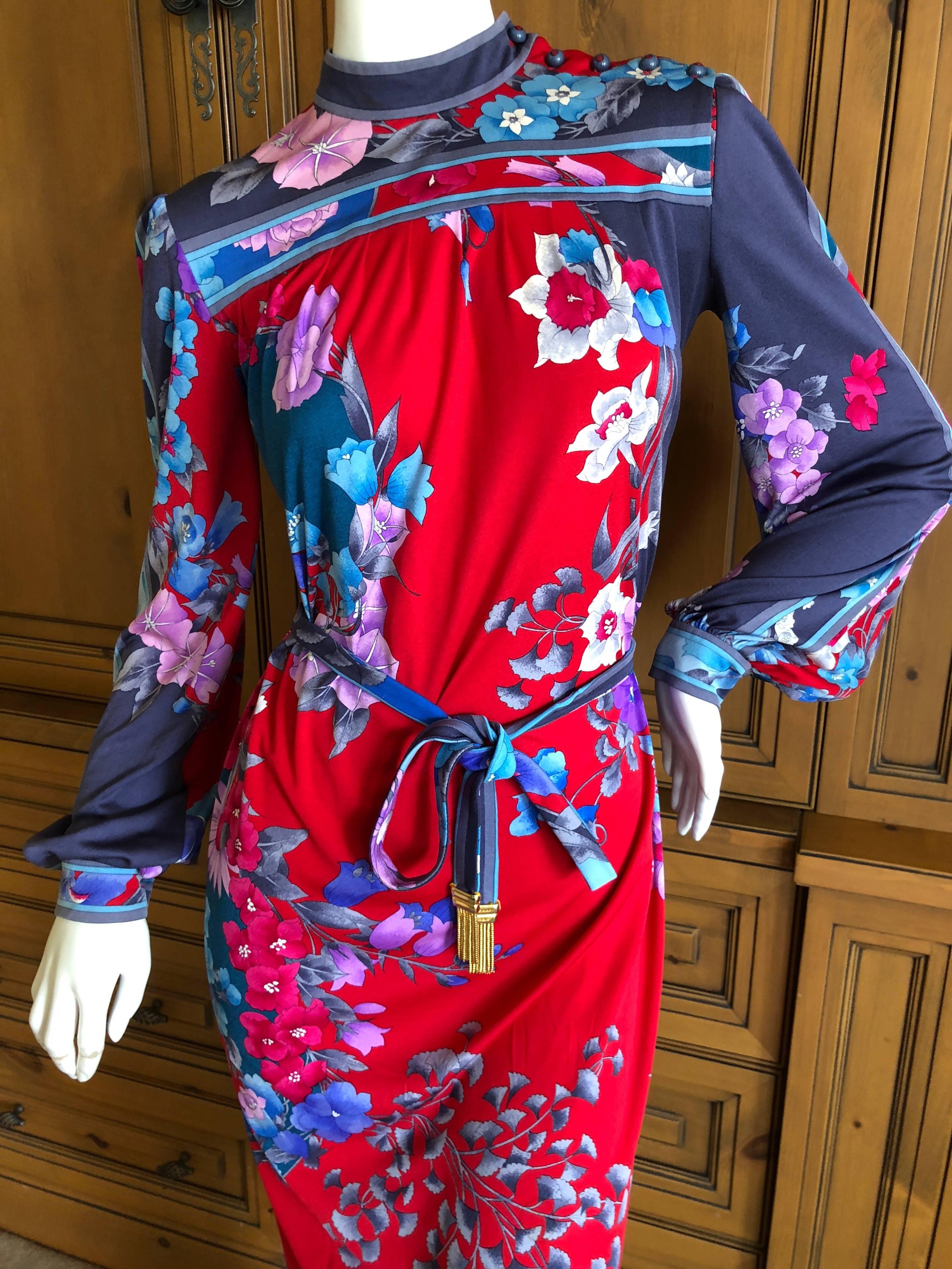 Leonard Paris Colorful 1970's Floral Silk Jersey Poet Sleeve Dress with Belt
Leonard , Paris was a contemporary of Pucci, using silk jersey printed in their signature florals, Leonard was as expensive, if not more, than Pucci.
 Featuring a mock