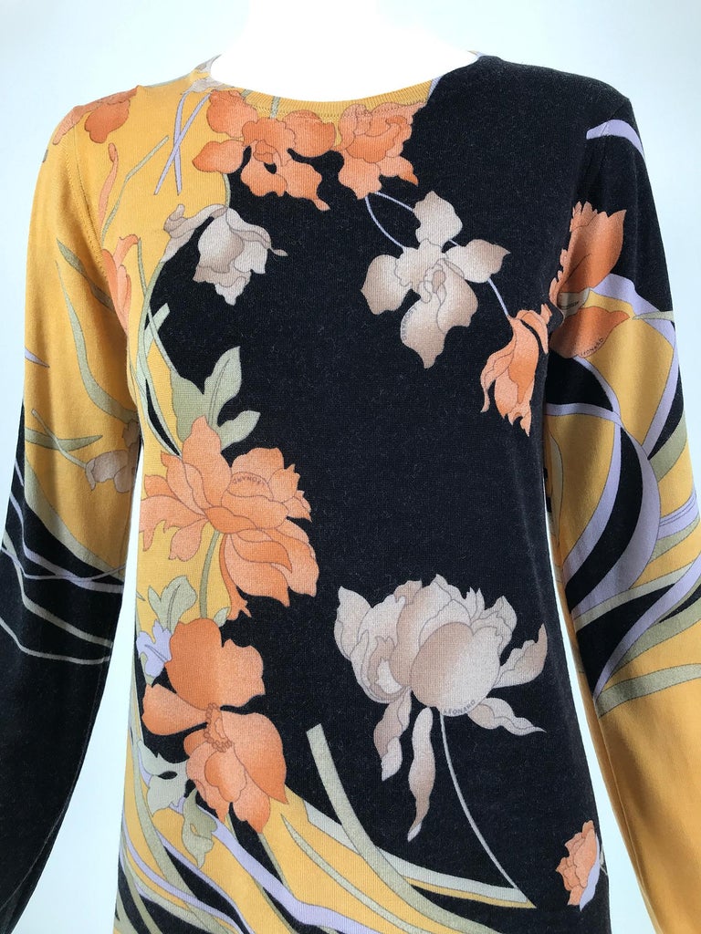 Leonard Paris fine wool knit floral pullover sweater from the 1990s. Jewel neck, long sleeve sweater with ribbed collar. Fits like a size small-medium
      In excellent wearable condition.  All our clothing is dry cleaned and inspected for
