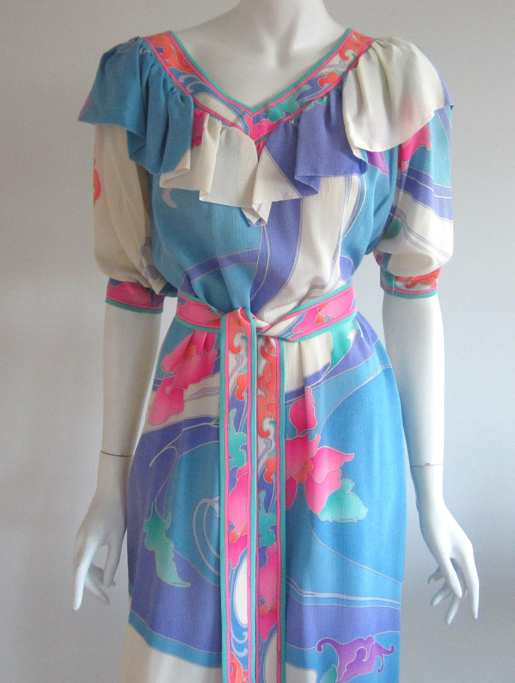 Leonard Paris Floral Print Shift  Dress Made in France 1980s. Matching scarf belt, wear as a belt or head band. Ruffled collar and pockets! Will fit a variety of sizes becasuse of it's cut. Measuring up to 40in. Chest -- Waist up to 40in. -- Hips up