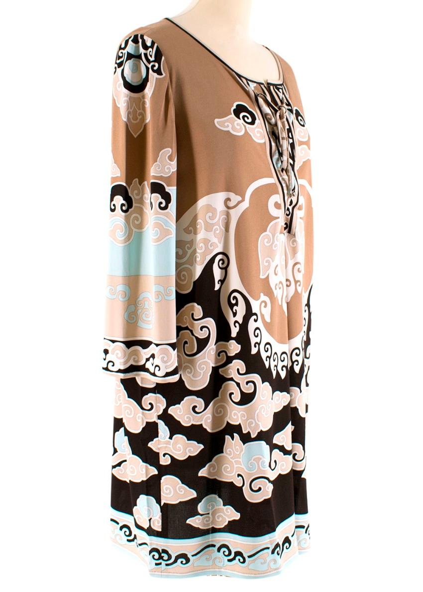Leonard Paris Light Brown Abstract Pattern dress 

- Abstract pattern in black blue and white
- Light weight soft touch dress
- Slip on 
- Round neck with patterned string and silver-tone ends
- Long sleeves

Made in Italy 

Dry Clean Only