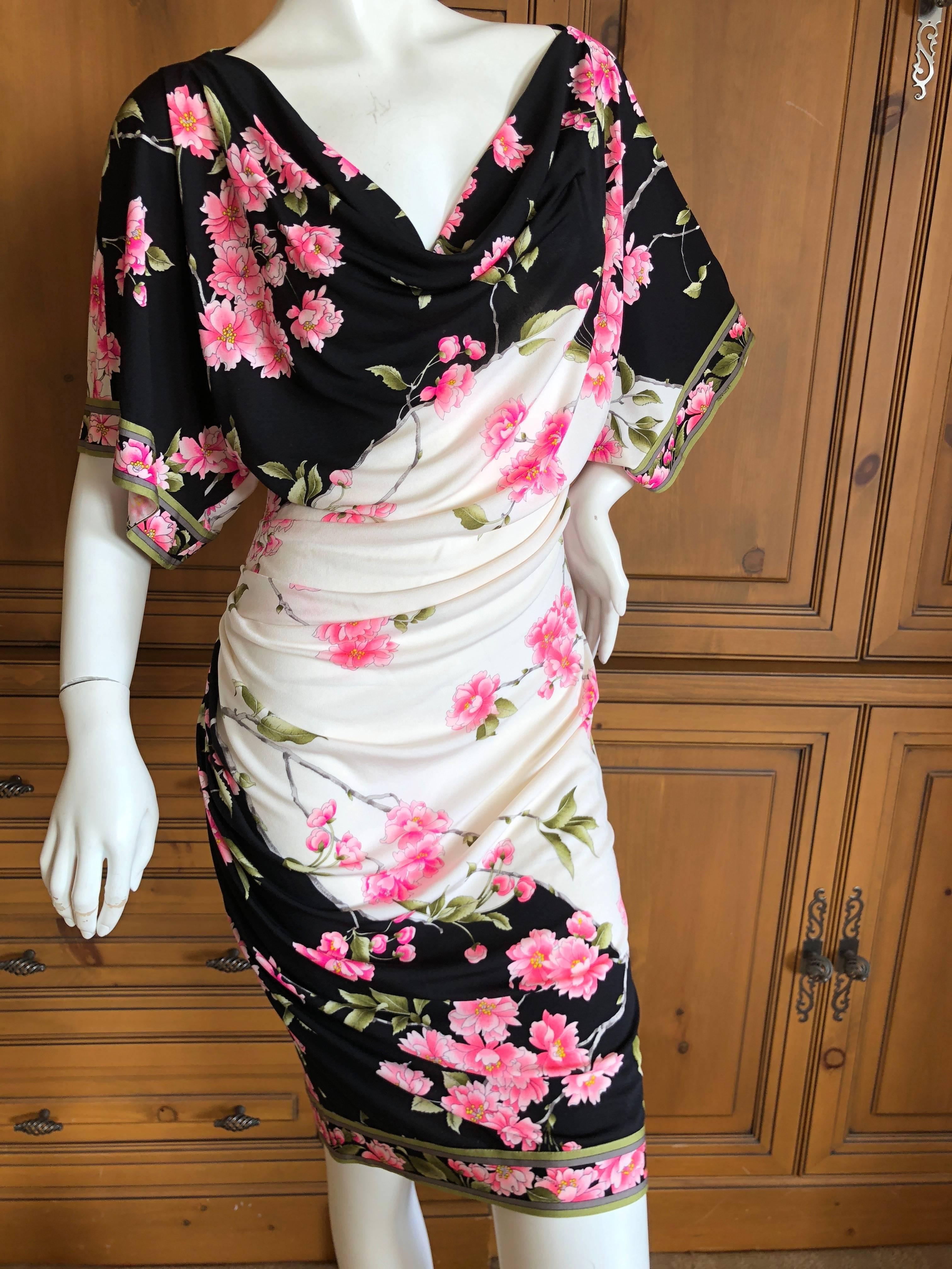 Lovely floral print silk jersey dress from Leonard Paris .
Leonard Paris was a contemporary of Pucci, both houses creating brilliant 60's patterns on silk jersey.
 Both were very expensive, and carried in the best stores internationally.
There is a