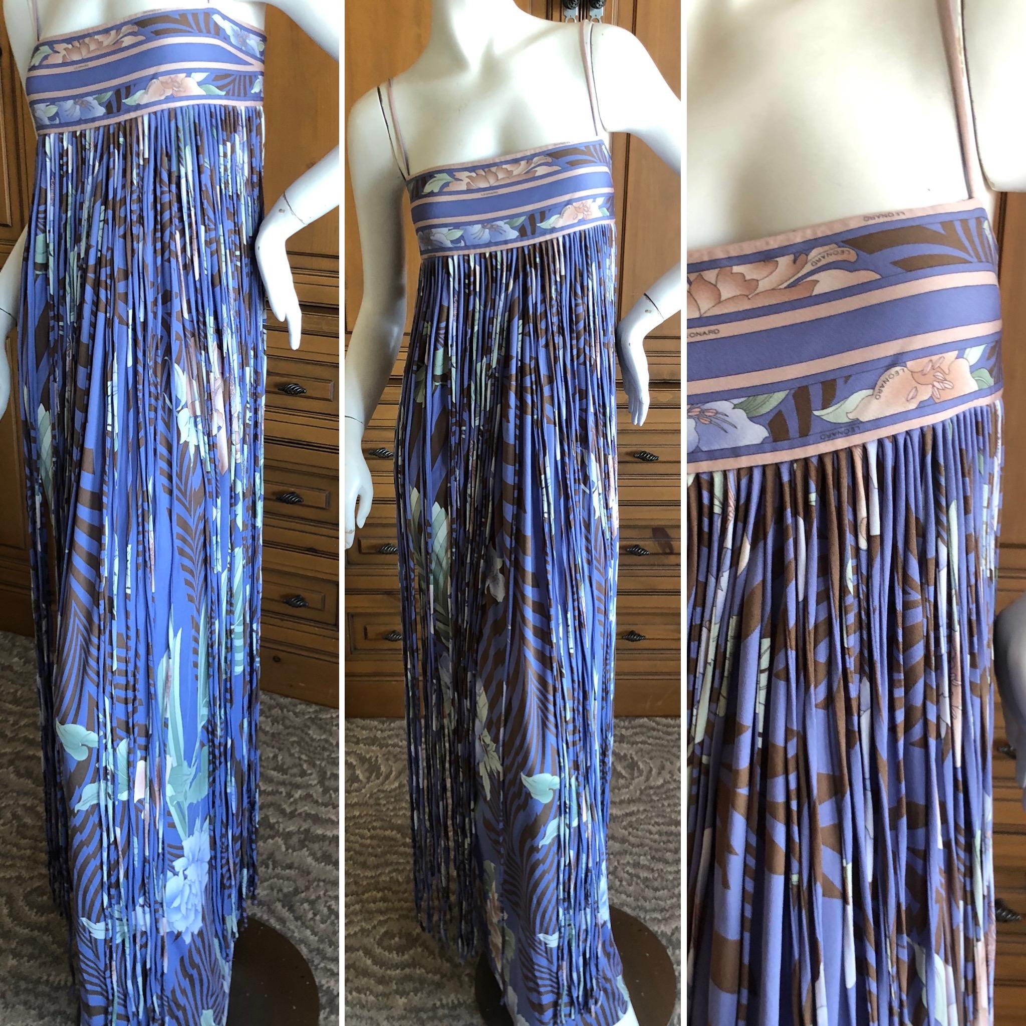 Leonard Paris Silk Jersey Unusual Vintage Long Evening Dress with Fringe.
This is so pretty, the front embellished with floor length fringe created in the same silk jersey formed in to cord fringe.
Leonard Paris was a contemporary of Pucci, both