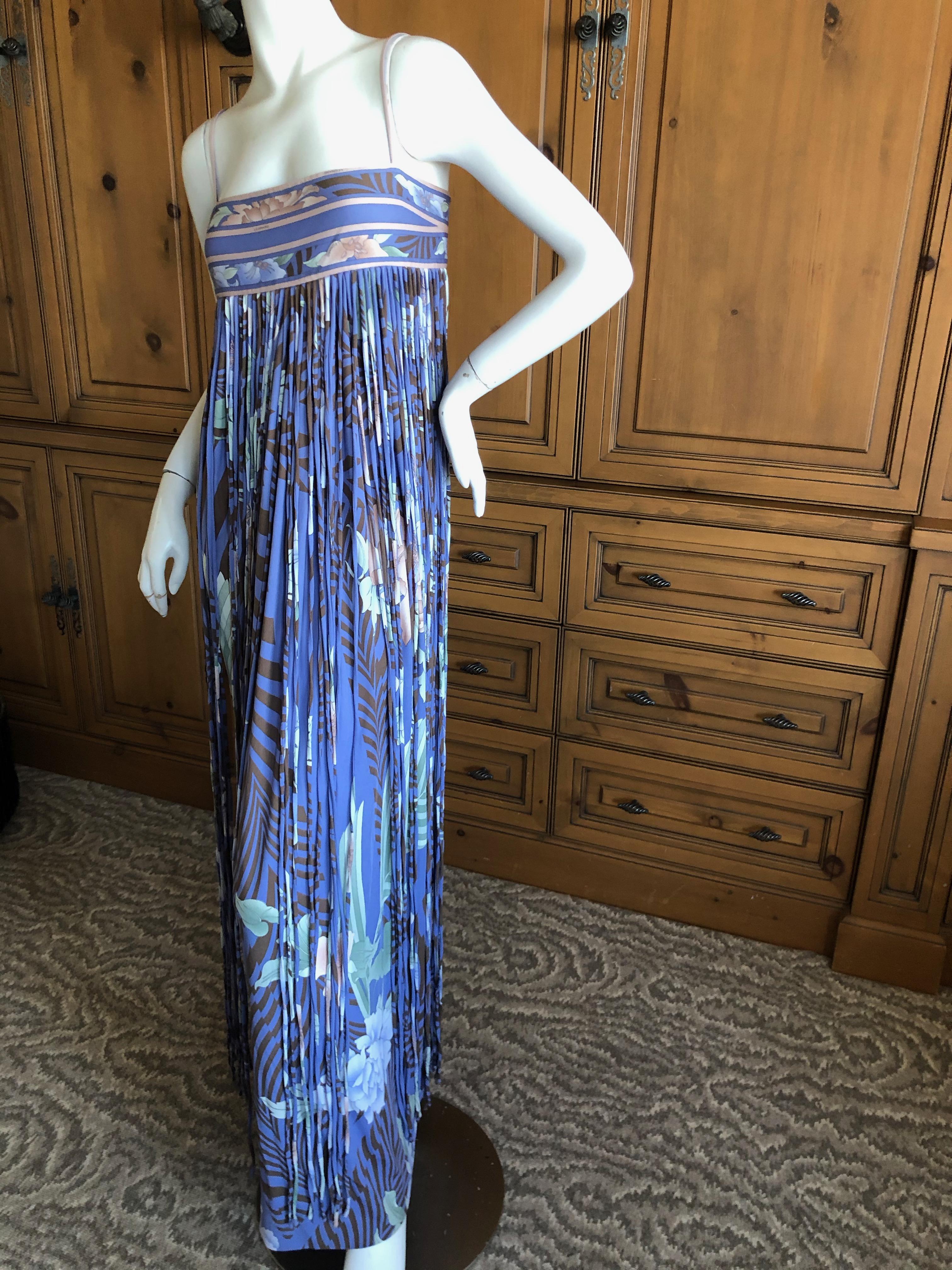 Leonard Paris Silk Jersey Unusual Vintage Long Evening Dress with Fringe.
This is so pretty, the front embellished with floor length fringe created in the same silk jersey formed in to cord fringe.
Leonard Paris was a contemporary of Pucci, both