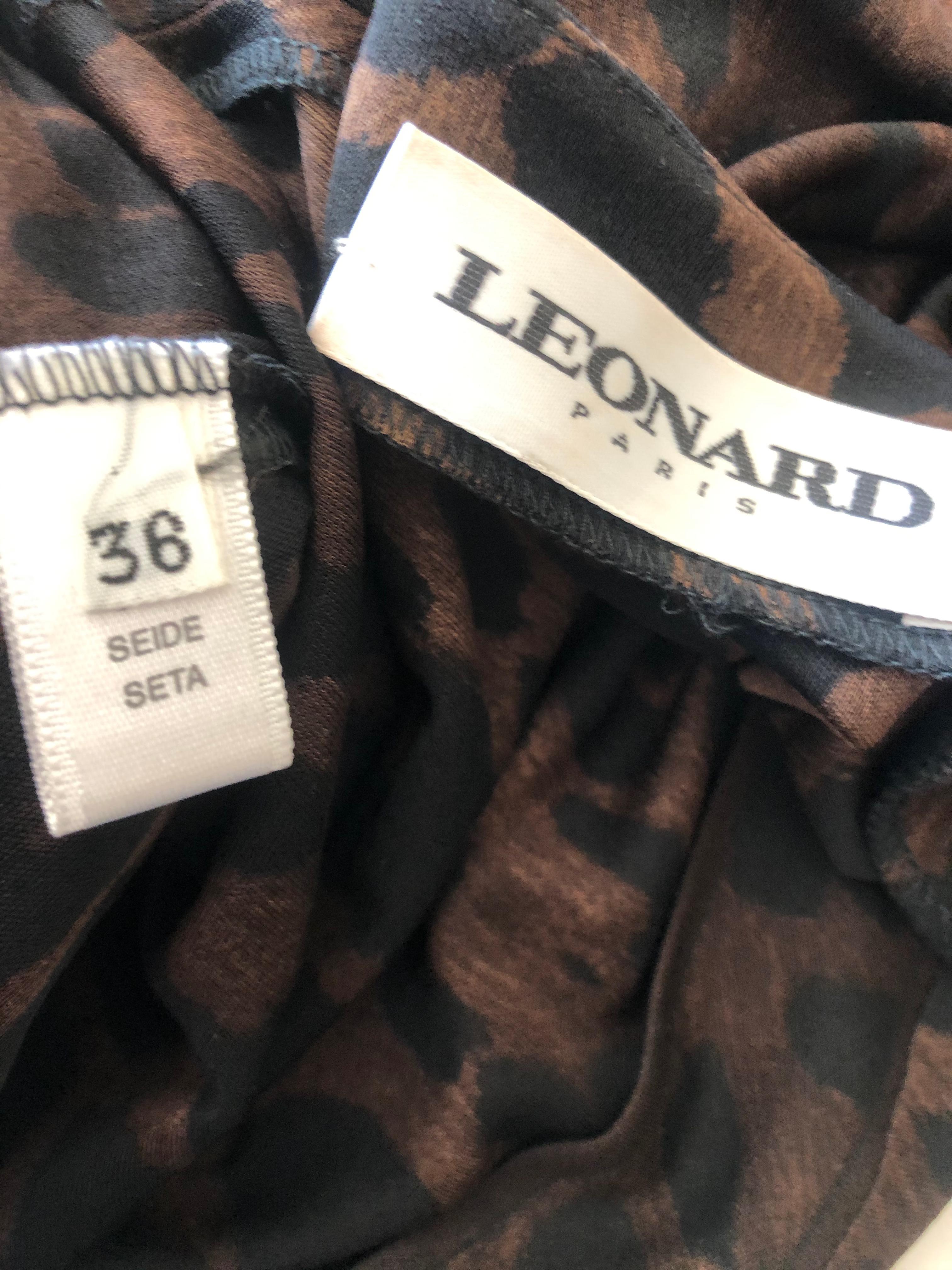 Leonard Paris Silk Jersey Vintage Low Cut Leopard Print Cocktail Dress
So chic, very very low cut, zips in front under scarf at waist
Leonard Paris was a contemporary of Pucci, both houses creating brilliant 60's patterns on silk jersey.
 Both were