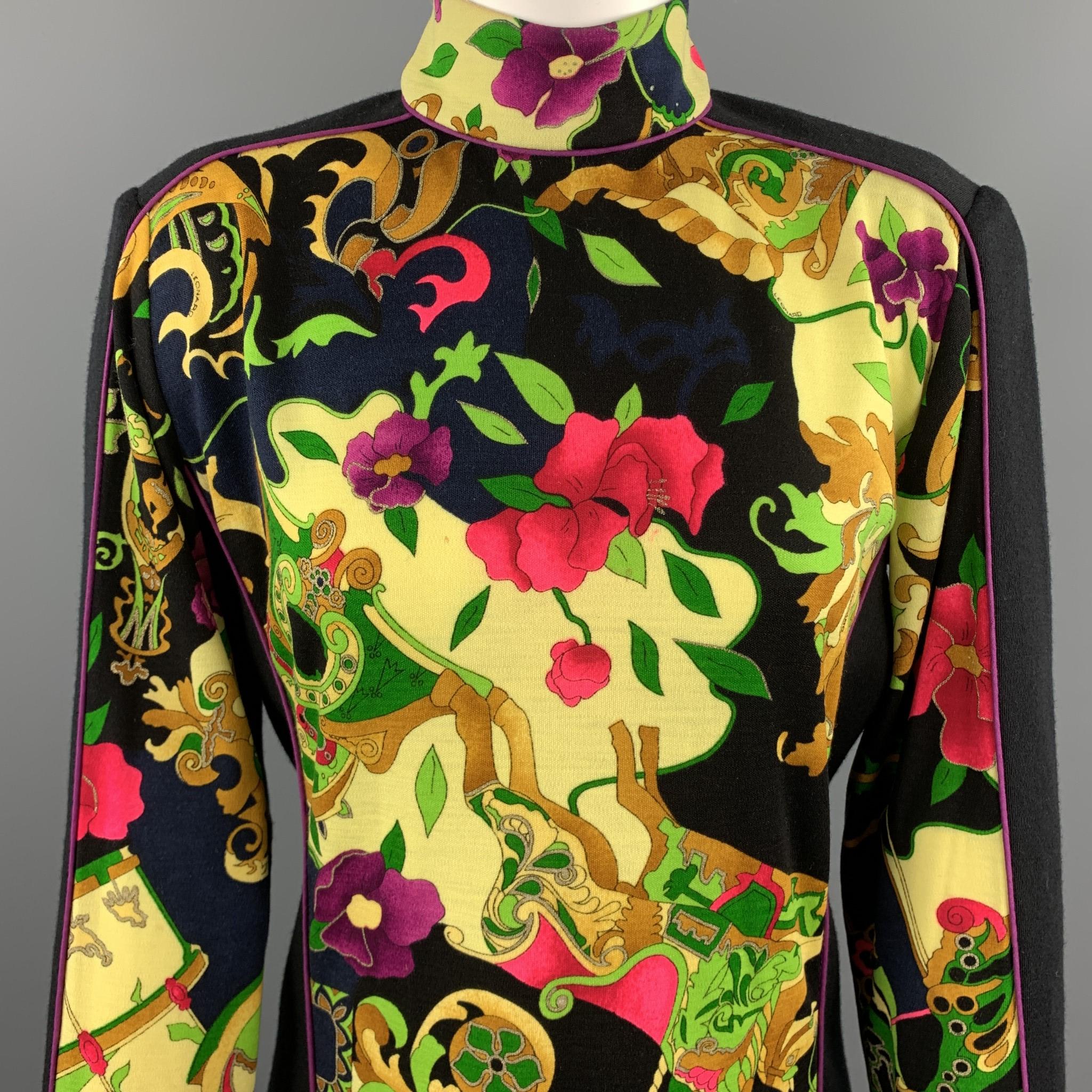 Vintage LEONARD PARIS dress comes in black wool stretch jersey knit with a mock neck, long sleeves, and yellow floral print panel. Made in Italy.

Very Good Pre-Owned Condition.
Marked: 2

Measurements:

Shoulder: 16 in.
Bust: 40 in.
Waist: 36