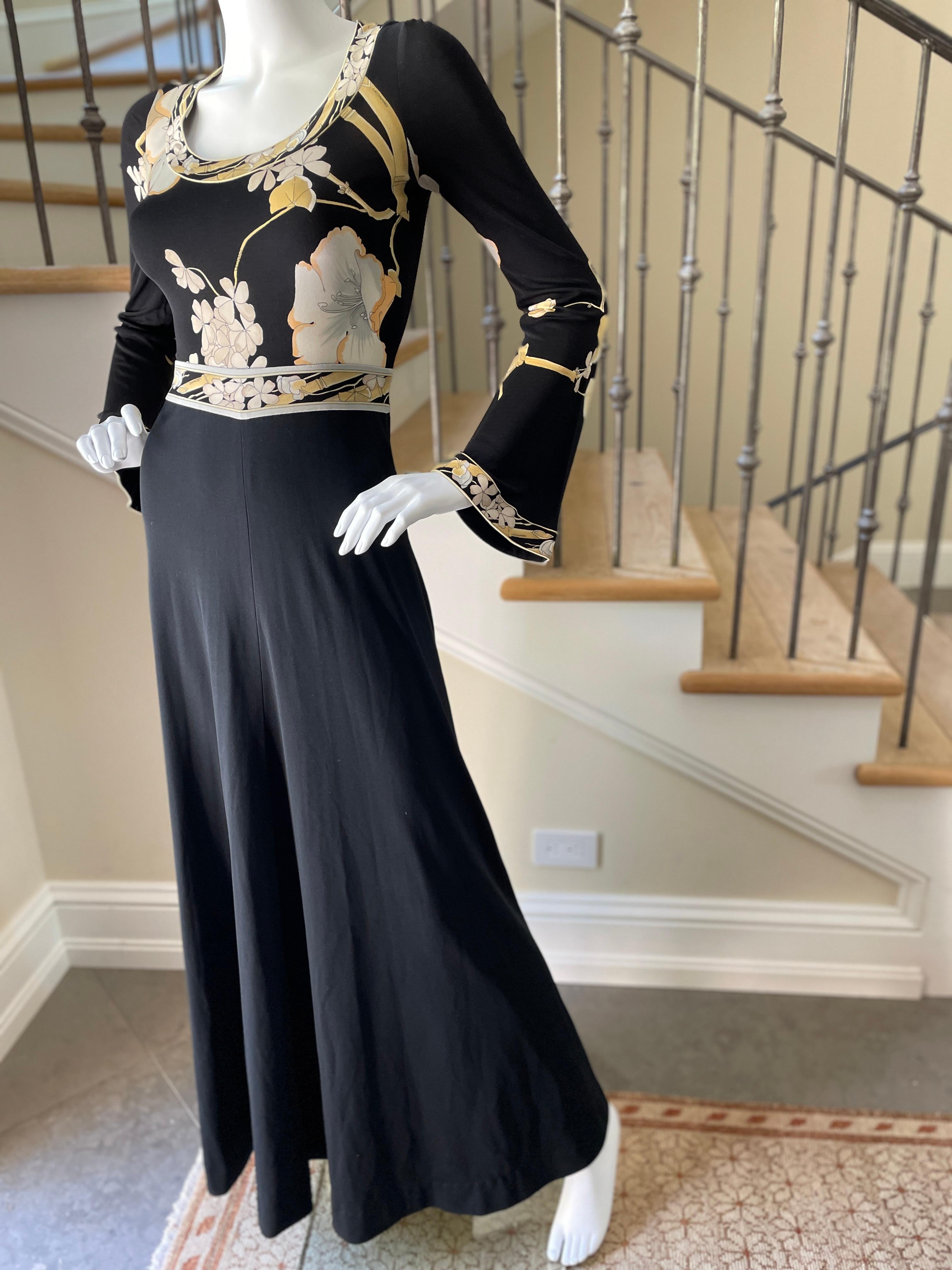 Leonard Paris Vintage 70's Long Silk Jersey Floral Dress 
So pretty, please use the zoom lens to see details.
Leonard Paris was a contemporary of Pucci, both houses creating brilliant 60's patterns on silk jersey.
Both were very expensive, and