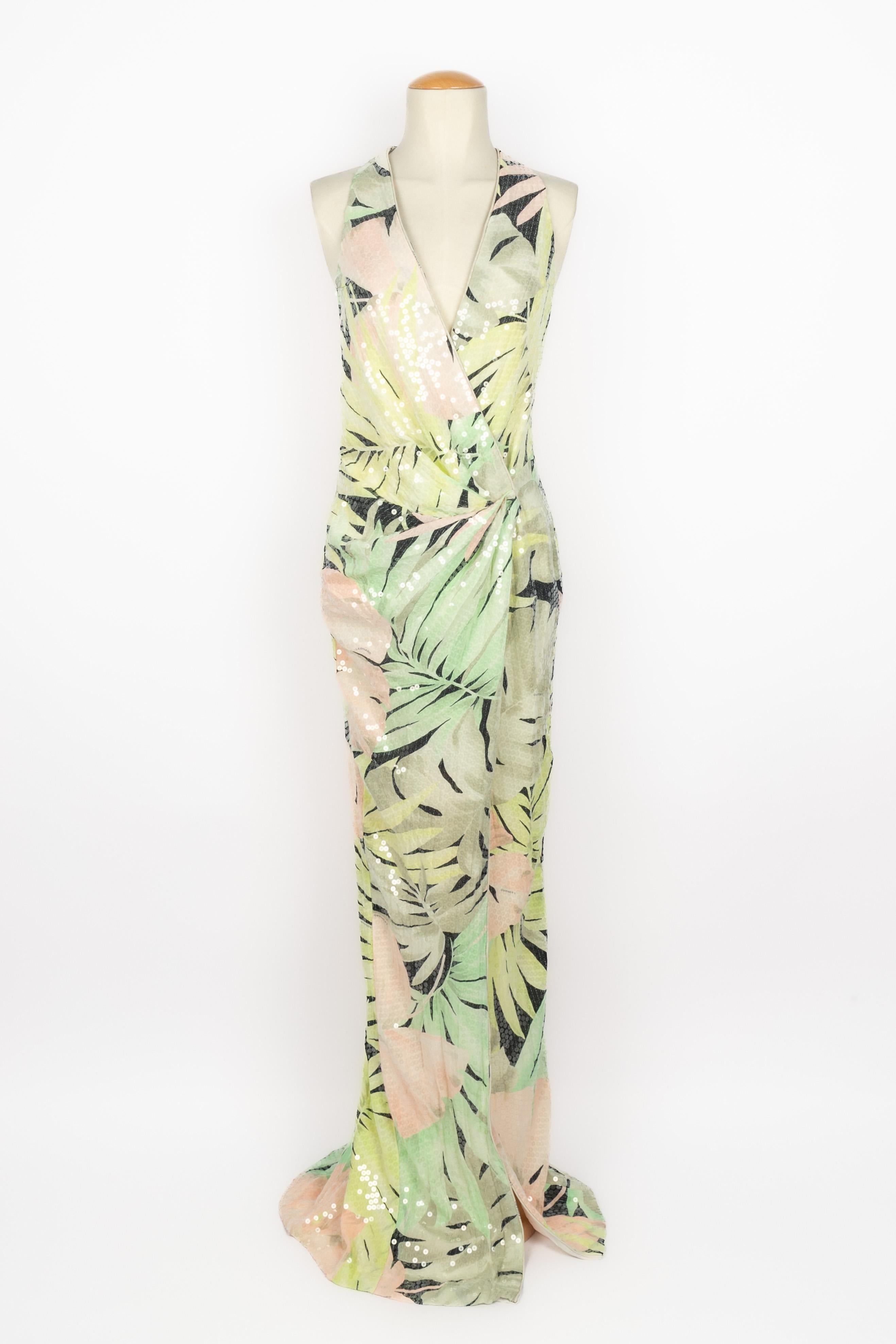 LÉONARD - (Made in Italy) Long crossed dress with black and pastel-color tone abstract pattern, and embroidered with transparent sequins, tied around the neck. Size 40IT.

Condition:
Very good condition

Dimensions:
Length: about 160 cm

SKU:VR379