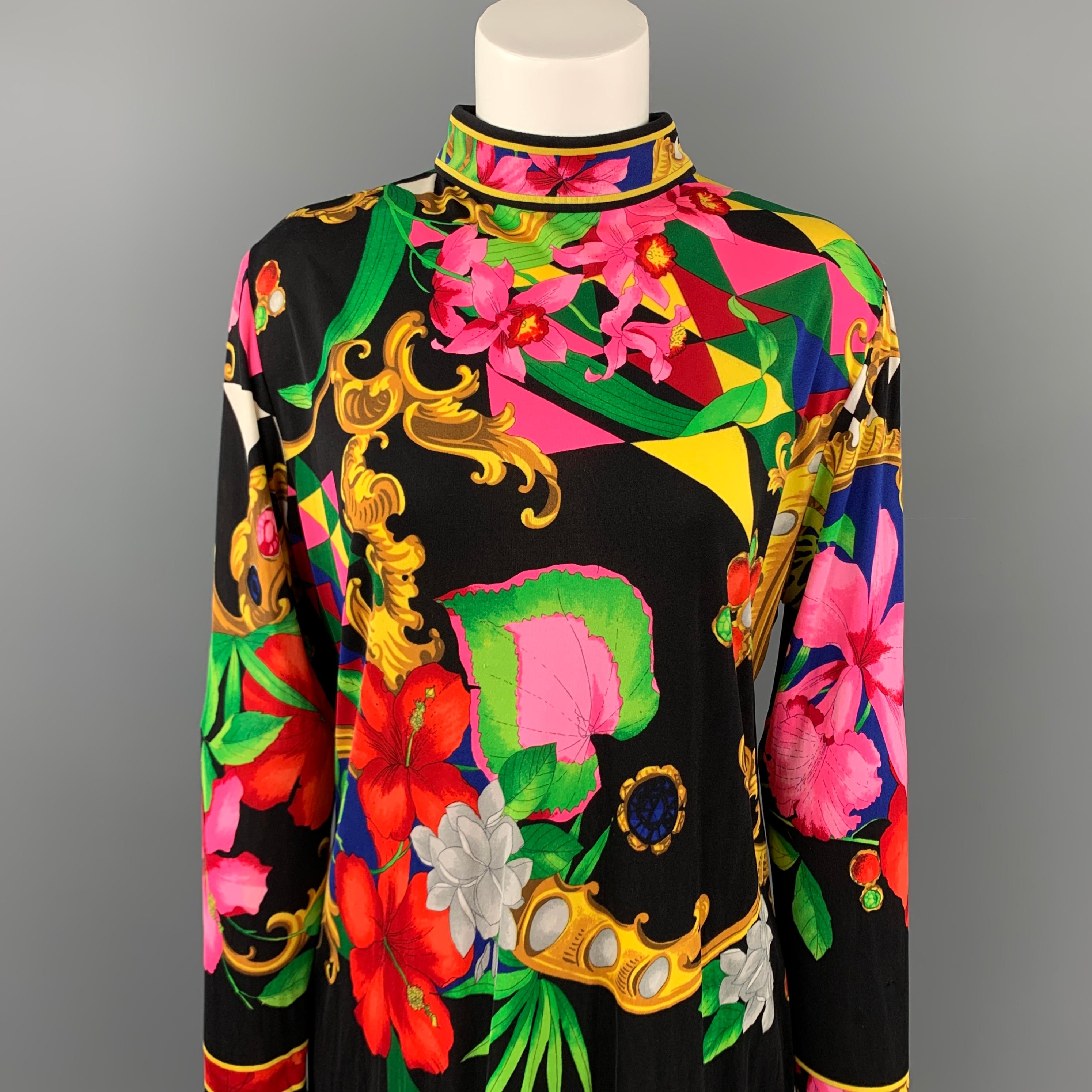 LEONARD blouse comes in a multi-color floral silk featuring a tunic style, long sleeves, and a back zip up closure. 

Very Good Pre-Owned Condition.
Marked: 3

Measurements:

Shoulder: 16.5 in. 
Bust: 42 in.
Sleeve: 27 in. 
Length: 29 in. 

