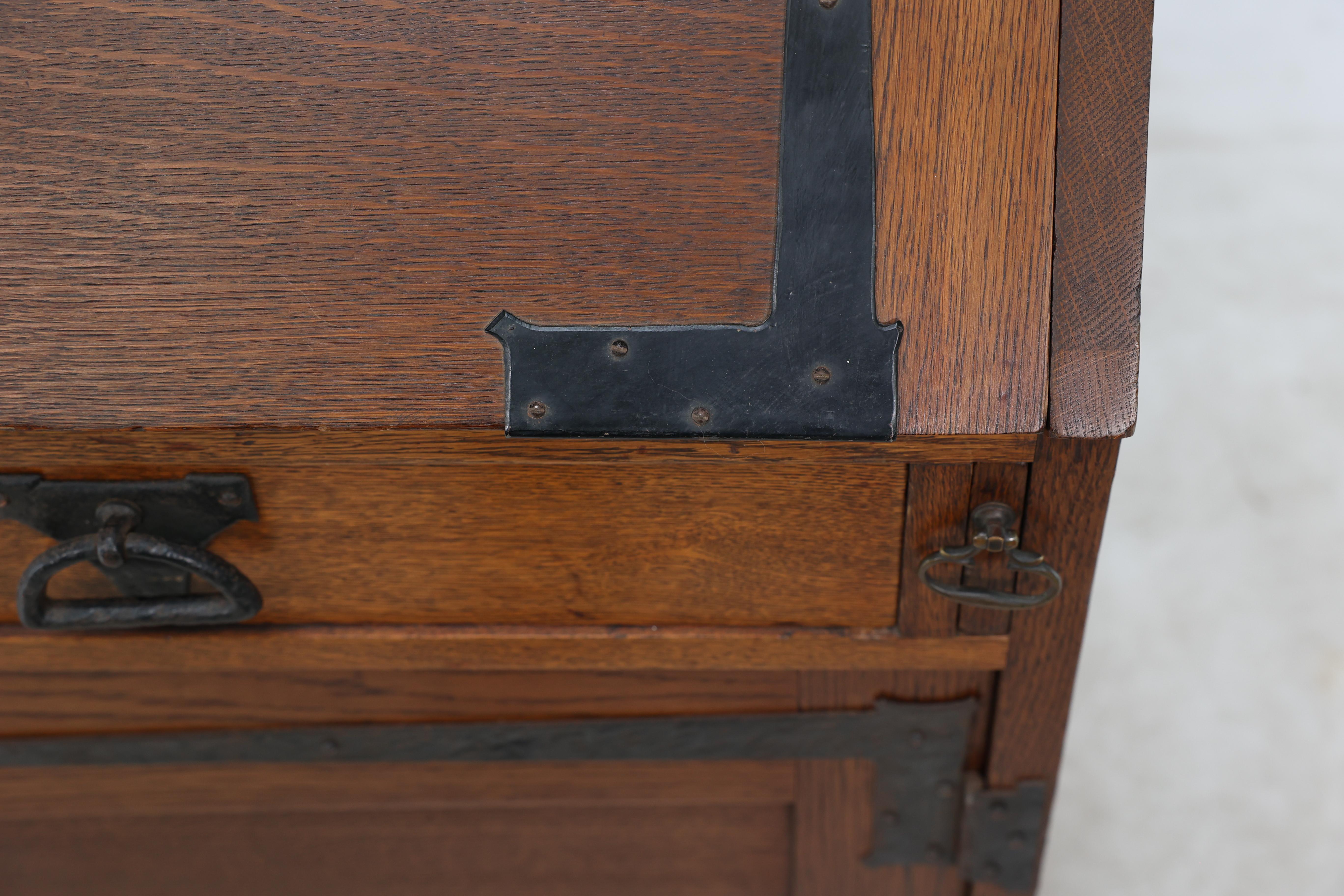 Leonard Wyburd for Liberty & Co. An Arts & Crafts oak bureau with iron hinges For Sale 6