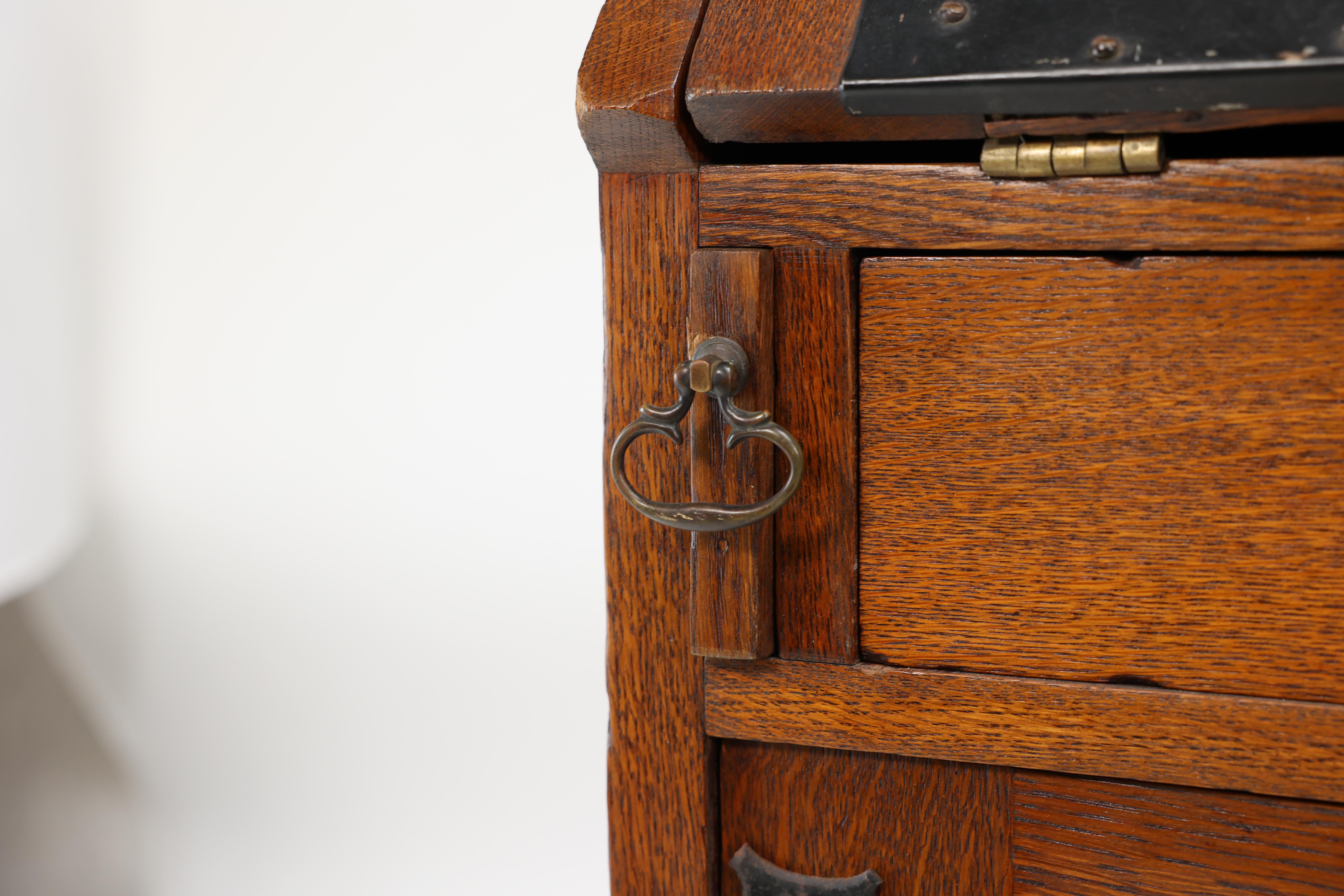 Leonard Wyburd for Liberty & Co. An Arts & Crafts oak bureau with iron hinges For Sale 10