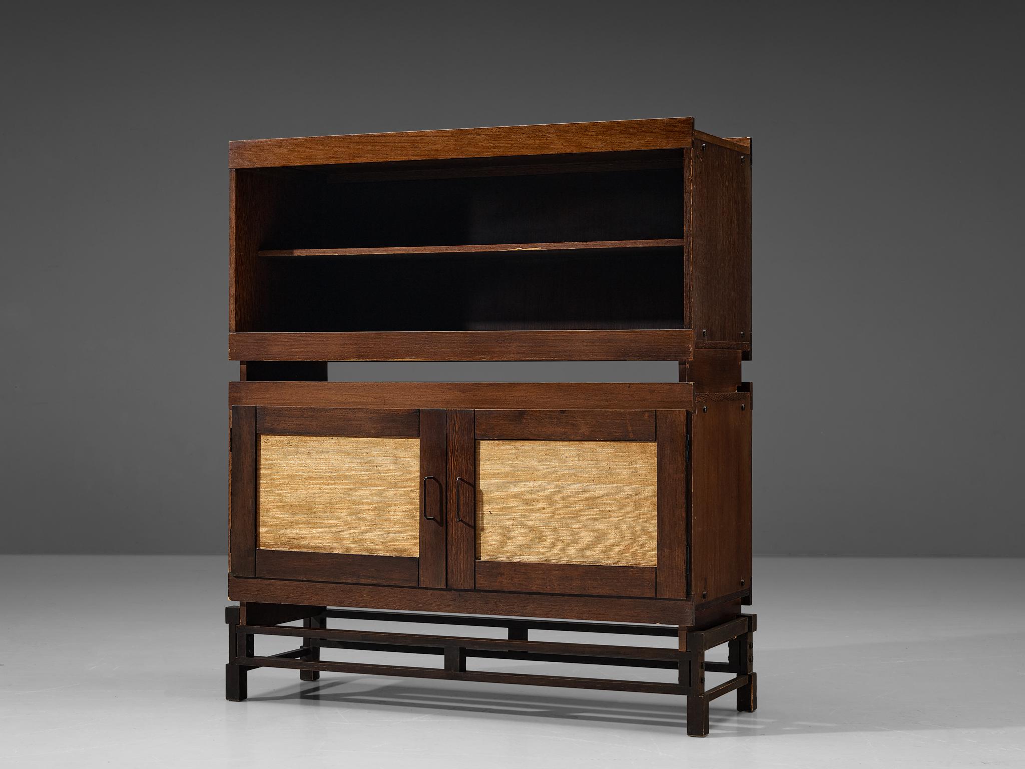 Leonardo Fiori for ISA Bergamo, cabinet, stained oak, seagrass, metal, Italy, 1950s

Beautiful cabinet designed by Leonardo Fiori for ISA Bergamo. The combination of the intense dark stained oak and the refined woven seagrass results in an exotic