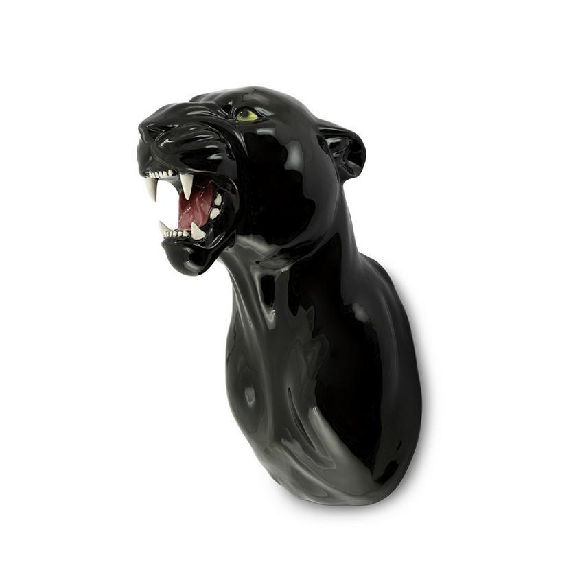 Wall decoration leopard black in
handcrafted ceramic. Hand painted
with black paint.

 