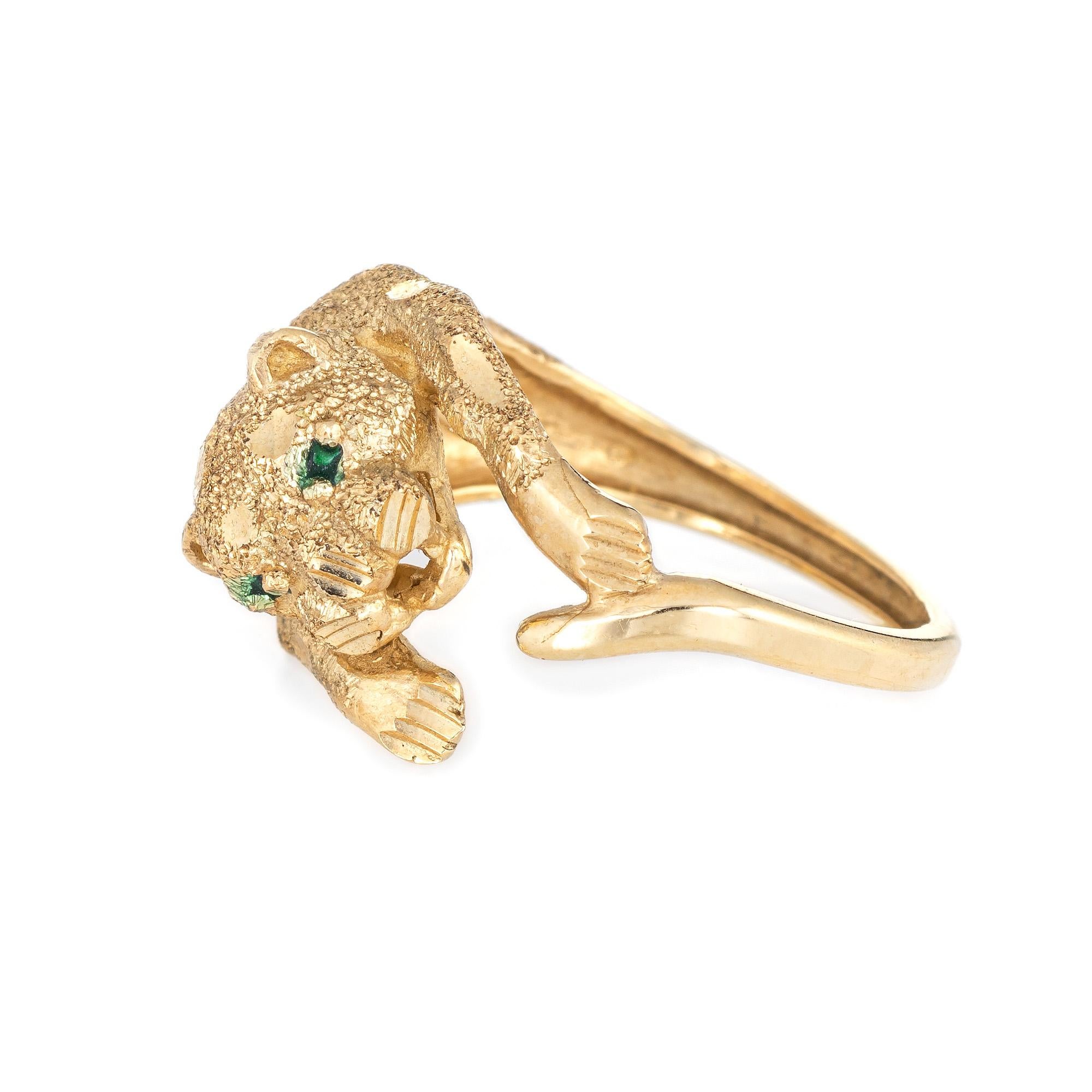 Stylish vintage leopard cat ring crafted in 14 karat yellow gold. 

The leopard features a textured design with scalloped 'spots' designed to catch light. The low rise ring (6.5mm - 0.25 inches) sits comfortably on the finger. The ring is impactful