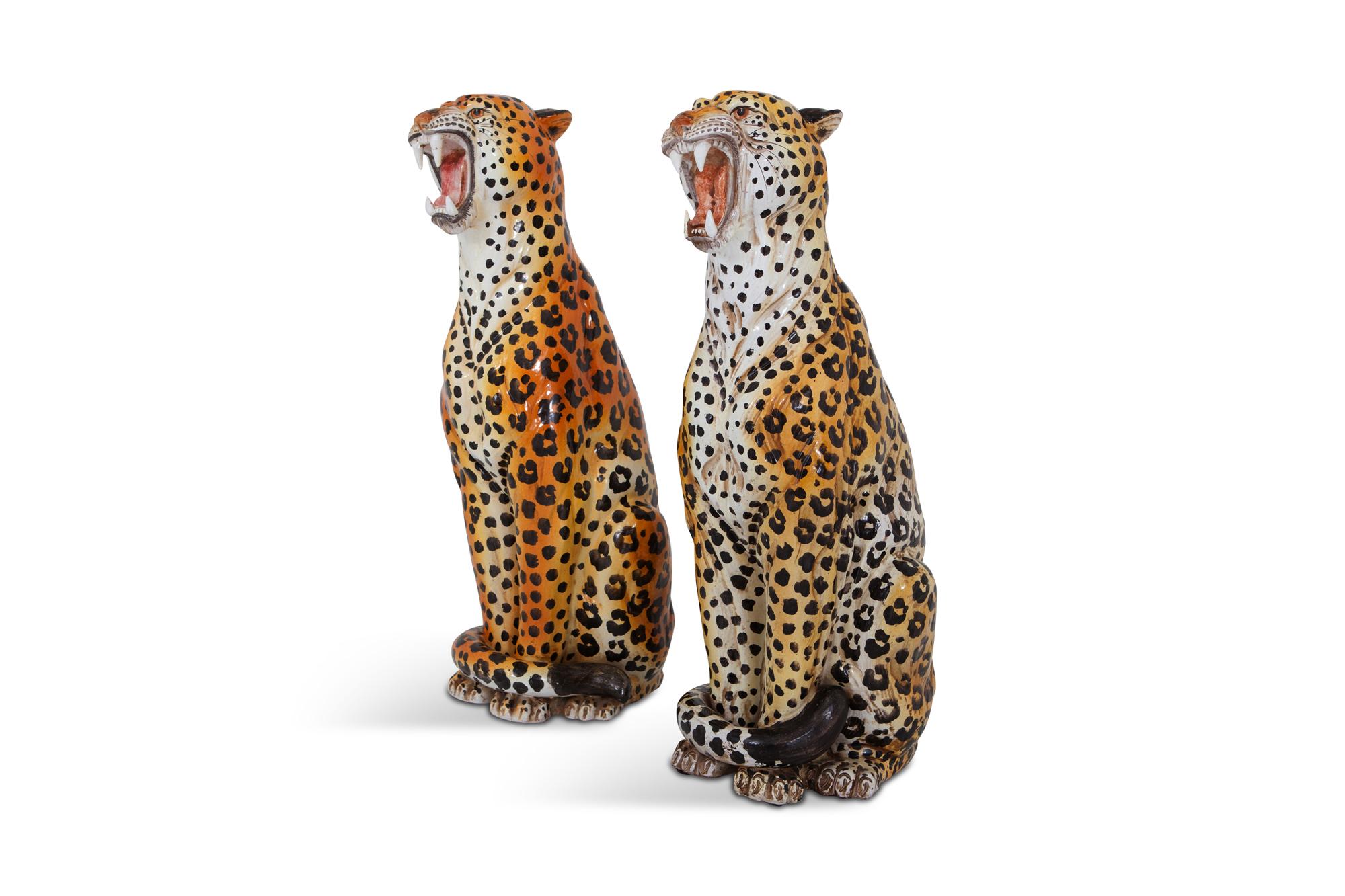 Ceramic seating leopard sculptures from Italy in the 1950s. 

Rare vintage pieces especially as a pair.

Would fit well in a Hollywood regency, Italian glam style eclectic interior.

Measures: A. W 34, D 46, H 83 cm
B. W 34, D 52, H 82 cm.