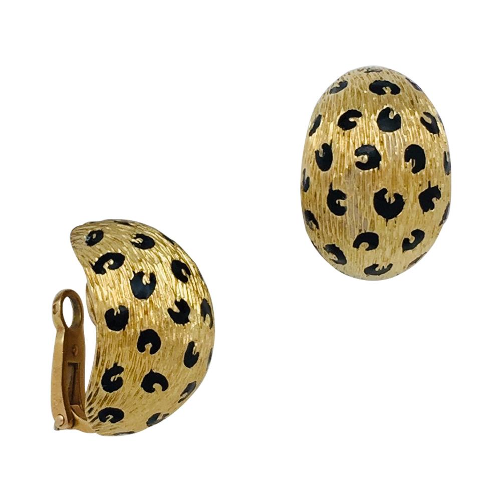 A 18kt textured yellow gold Fred pair of earrings, Leopard collection, enhanced with black enamel spots. 
Clip system.
Circa 1980