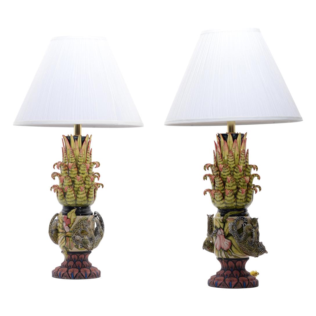 Designed by Senzo Duma Ceramics, this exquisite giraffe lamp pair is a true work of art, sculpted by master artisan Thabiso and hand-painted by Junoth in South Africa. Each lamp showcases two beautifully sculpted giraffes, elegantly intertwined