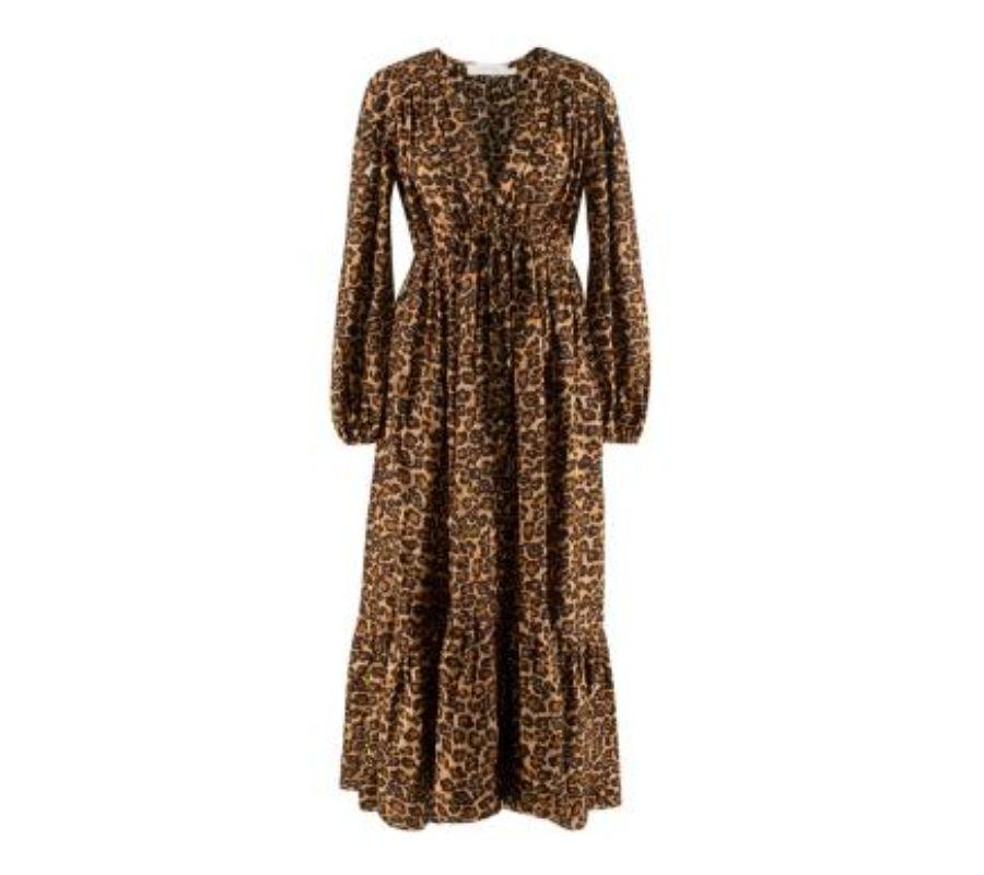 Zimmermann Leopard Print Silk Dress
 
 - Allover leopard print in natural hues
 - Bell sleeves
 - Tiered hemline
 -Drawstring waist
 - Button front
 
 Material:
 100% Silk
 Dry clean only
 
 PLEASE NOTE, THESE ITEMS ARE PRE-OWNED AND MAY SHOW SIGNS