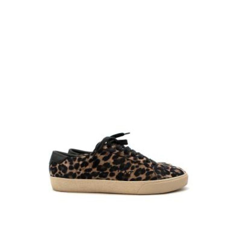 Saint Laurent Leopard Print Suede Court Classic Sneakers
 

 - Allover leopard print suede upper
 - Low top, tennis-style shoe
 - Lace up
 - Black leather logo embossed heel cuff
 - White rubber sole 
 

 Materials: 
 Suede 
 Leather 
 Rubber 
 

