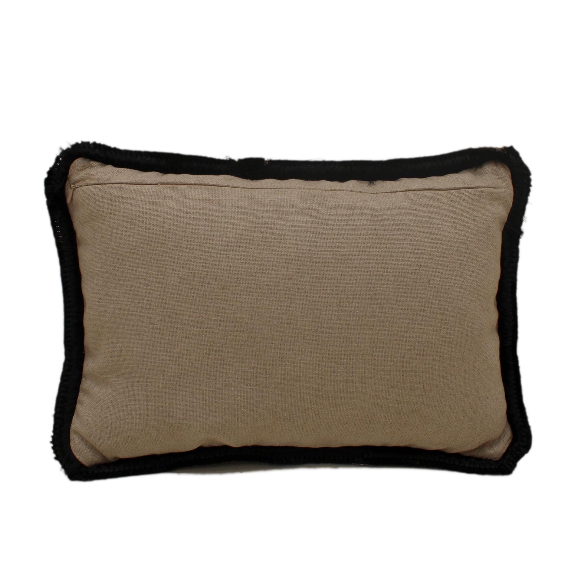 Leopard print velvet cushion in high quality cotton with double black tinsel trim and linen back with invisible zipper.
