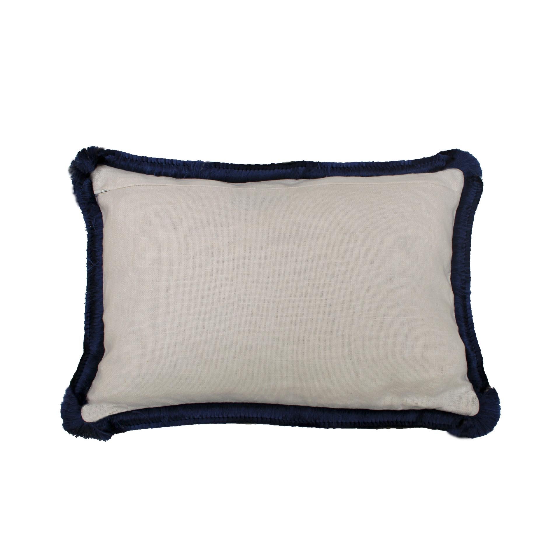 Velvet cushion in high-quality cotton with blue leopard print, double black tinsel trim, and linen back with invisible zipper on the back.