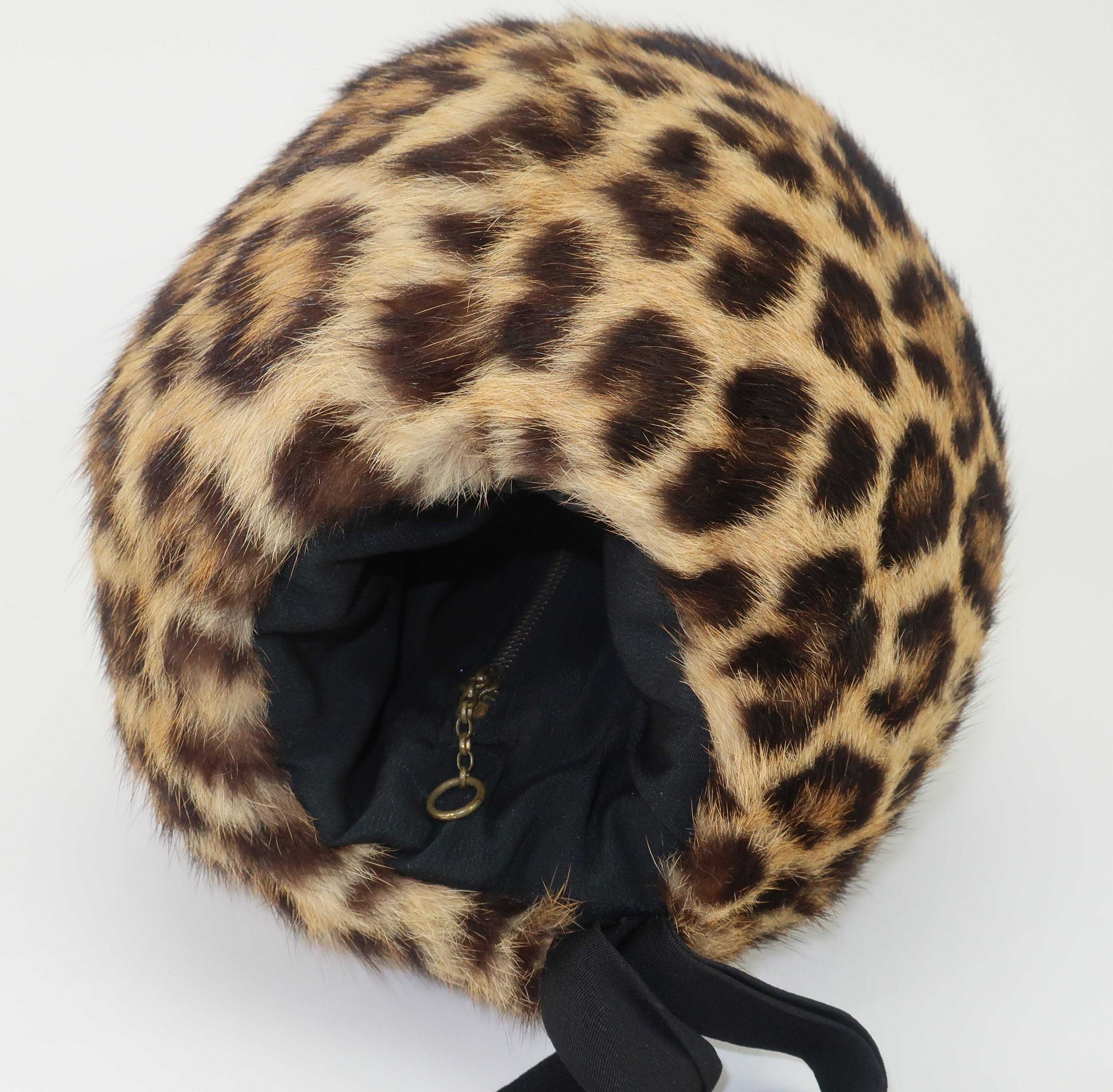 Muffs were a fashion accessory popular for their practical hand-warming use through the Victorian era. They fell out of favor in the early 20th century but enjoyed a glamorous revival from the 1930's through the 1950's. This 1950’s leopard printed