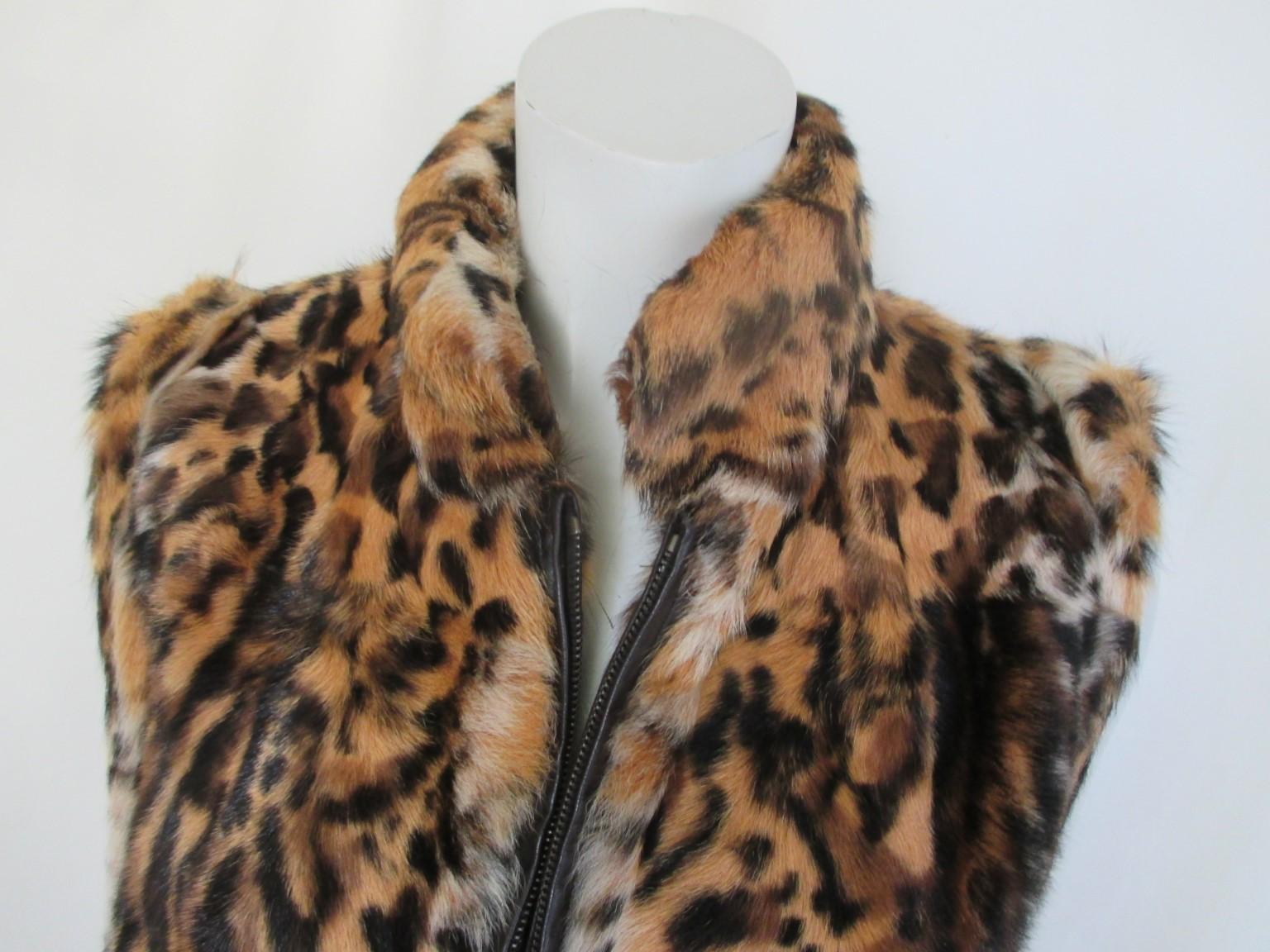 Panther printed Leopard Lapin vintage fur vest

We offer more exclusive fur & vintage couture items, view our front store

Details:
2 pockets, closing zipper, fully lined
Soft fur and very light to wear
Made in Switzerland by Ricky Models
Size is