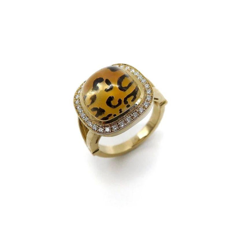 This ring is a signature piece from Kirsten's Corner.  It is a one of a kind ring.  The inspiration for this ring started with a Pauly reverse painted citrine cabochon. For decades this german company have been manufacturing individual stones