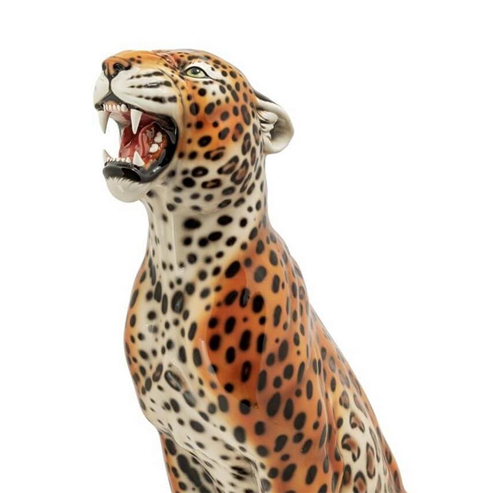 Sculpture leopard sit in hand painted ceramic.