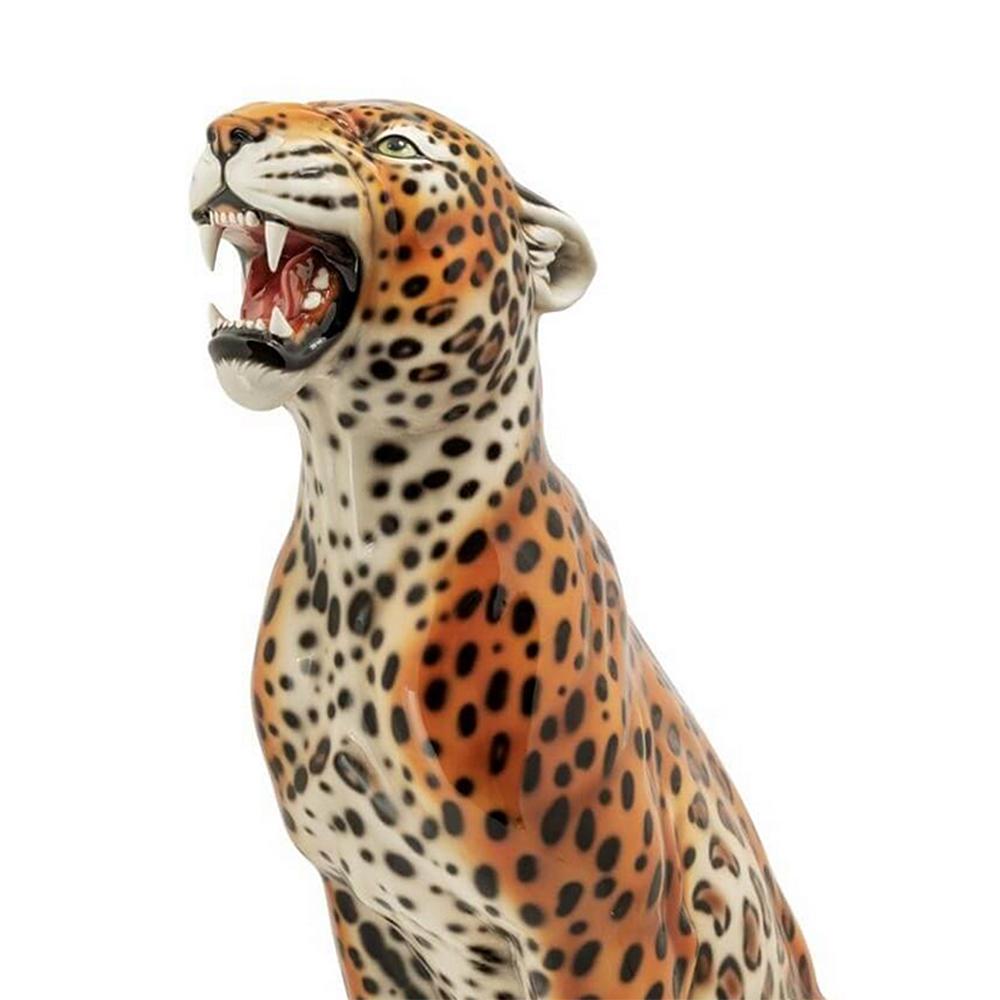 Sculpture leopard sit 
in hand painted ceramic.