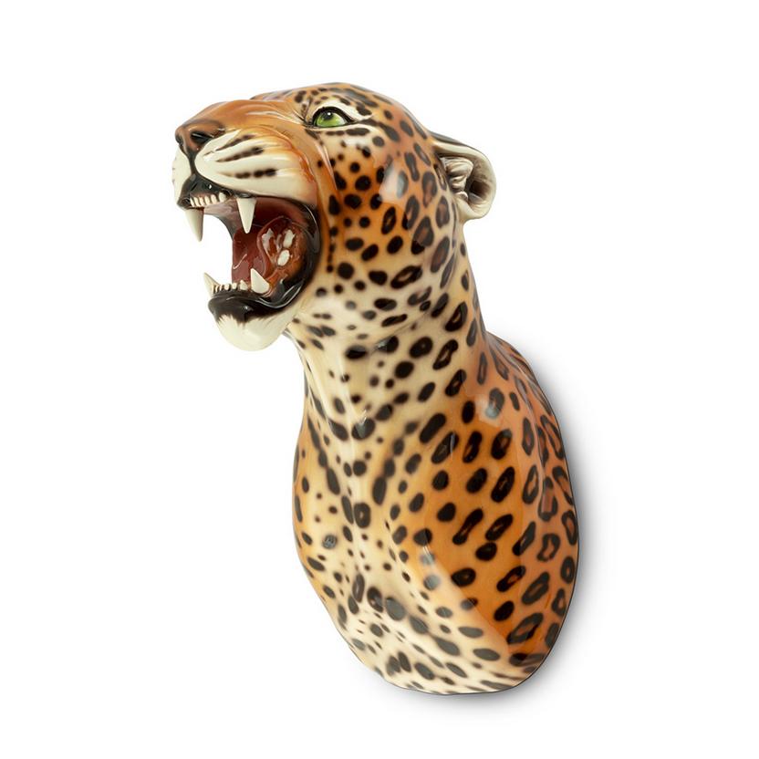 Wall decoration leopard spotted in
handcrafted ceramic. Hand painted
with black paint.
