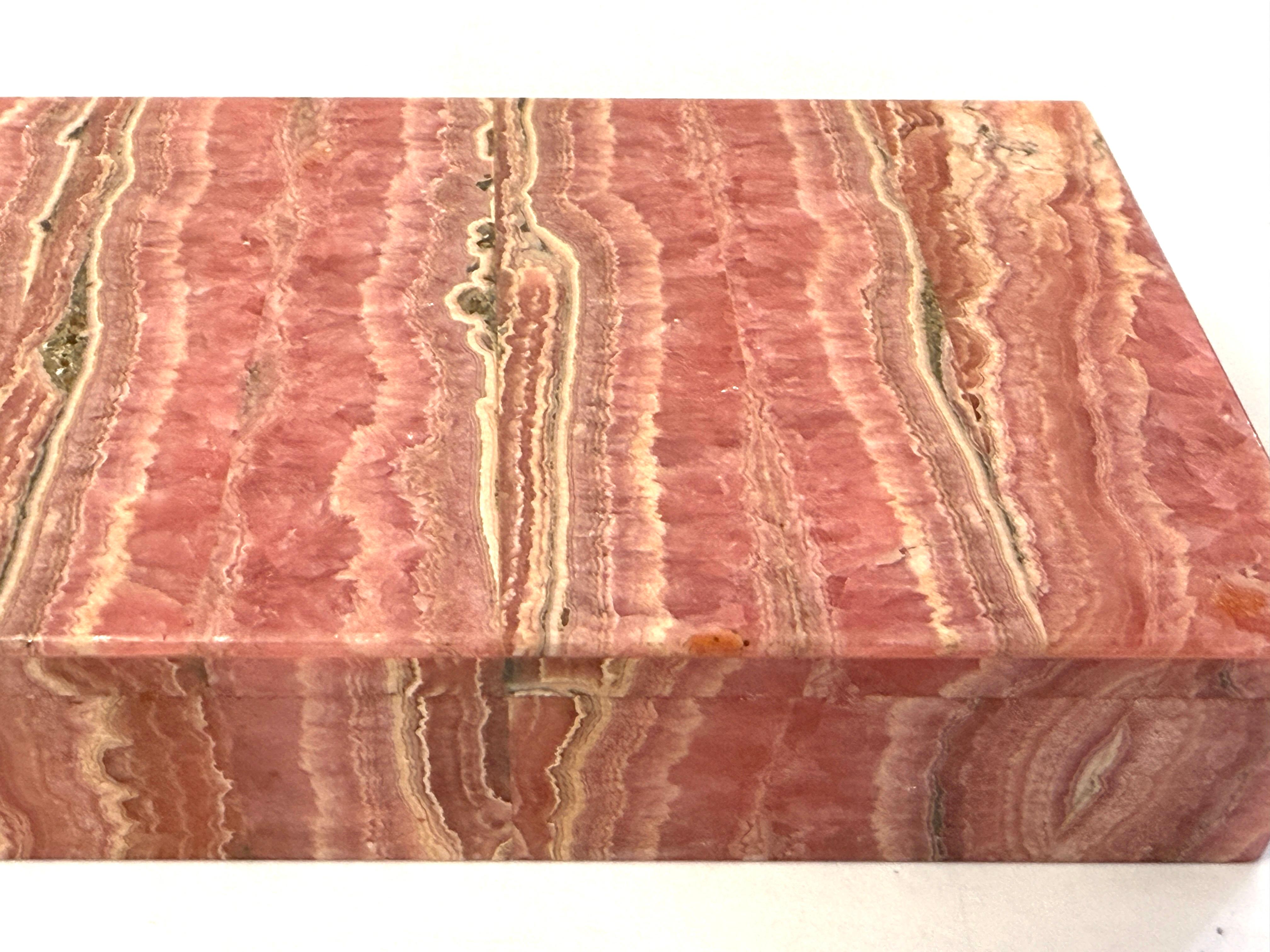 A stunning Rhodochrosite box retailed by the venerable Leopoldo Menegetti of Florence/ Firenze. The box probably dates to the 1950’s and is from a collection of 4 beautiful rare stone boxes we have for sale out of an estate collection. This box