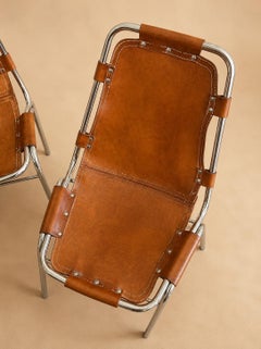 Les Arcs chairs by Charlotte Perriand