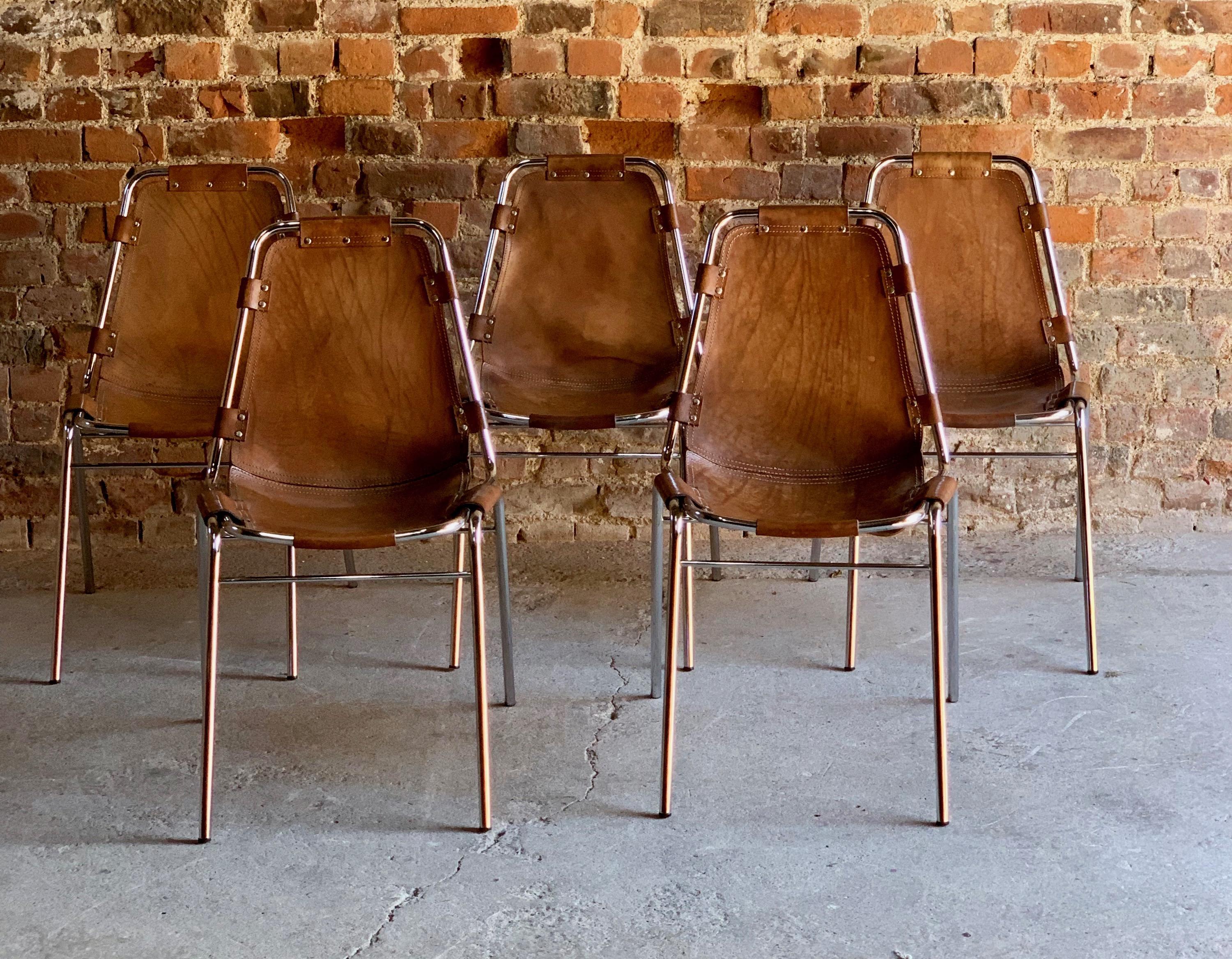 Les Arcs' Five dining chairs, 1970s

Fabulous set of Five tan leather 'Les Arcs' dining chairs manufactured by the Italian firm, Dal Vera, and selected by Charlotte Perriand for the Les Arcs ski resort, each chair consists of a chrome tubular frame