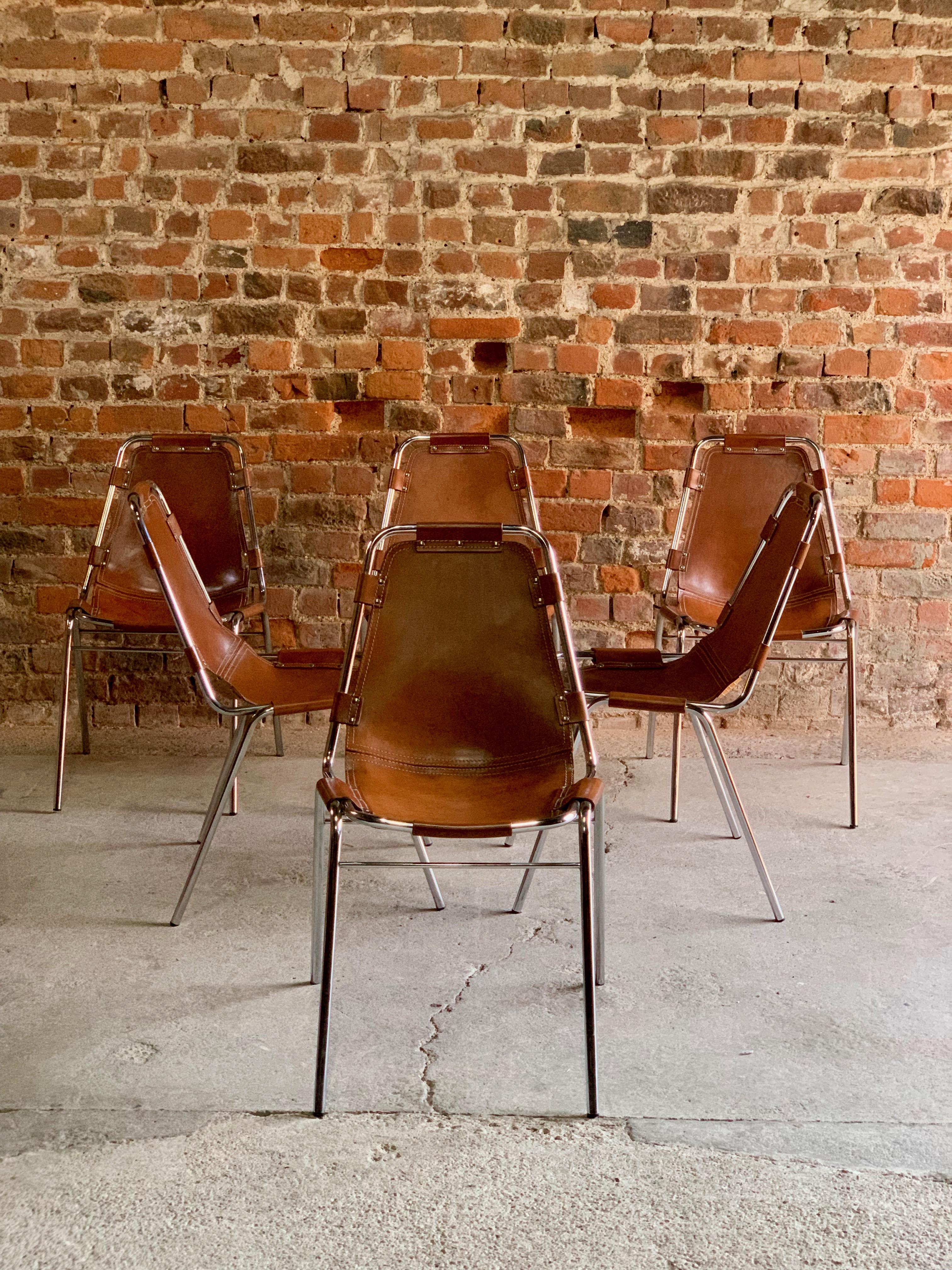 Les Arcs' Six Dining Chairs, 1970s

Fabulous set of six tan leather 'Les Arcs' dining chairs manufactured by the Italian firm, Dal Vera, and selected by Charlotte Perriand for the Les Arcs ski resort, each chair consists of a chrome tubular frame